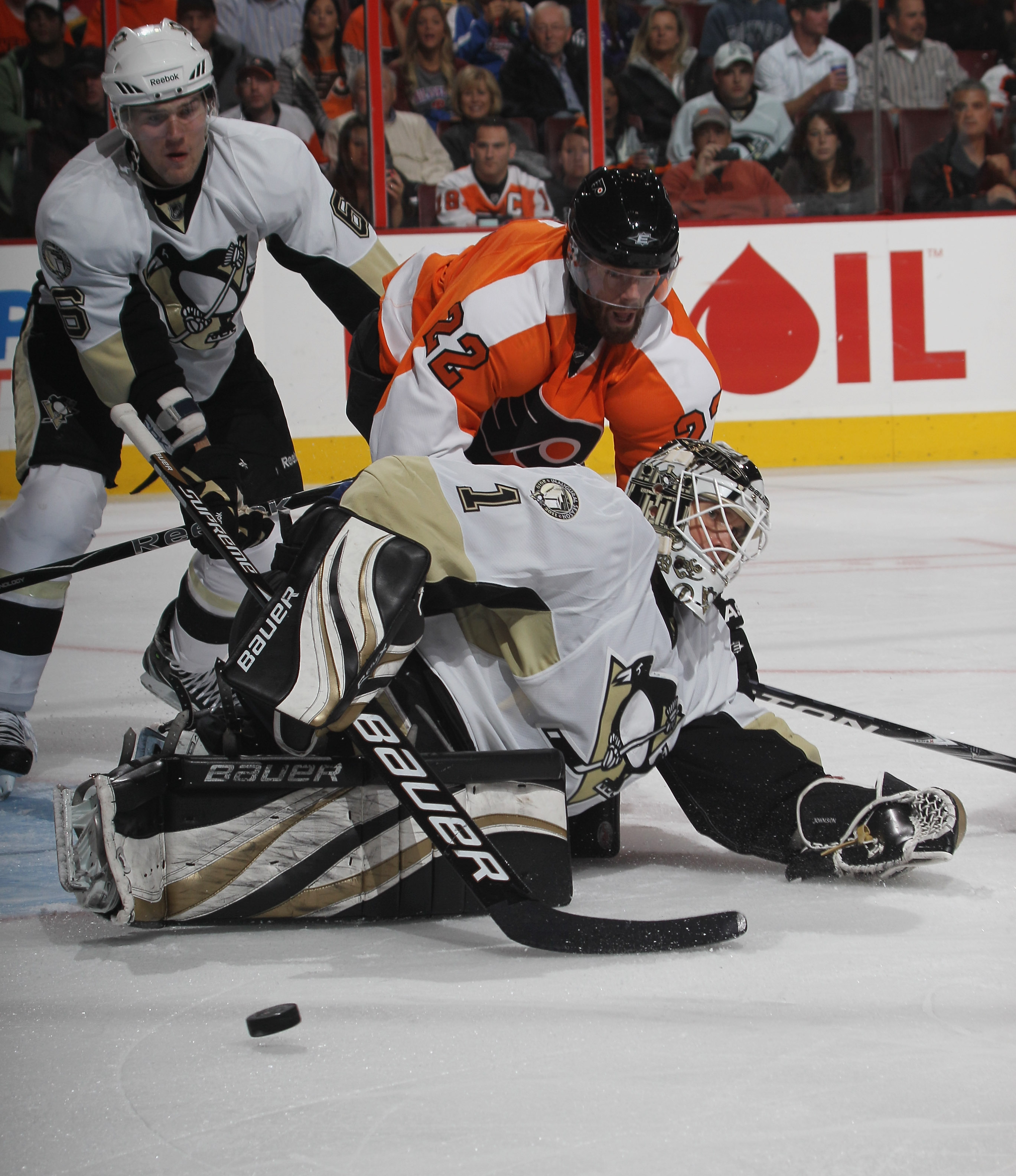 PHILADELPHIA - OCTOBER 16: Brent Johnson #1 of the Pittsburgh Penguins makes the save as Ville Leino #22 of the Philadelphia Flyers looks for the rebound at the Wells Fargo Center on October 16, 2010 in Philadelphia, Pennsylvania.  (Photo by Bruce Bennett