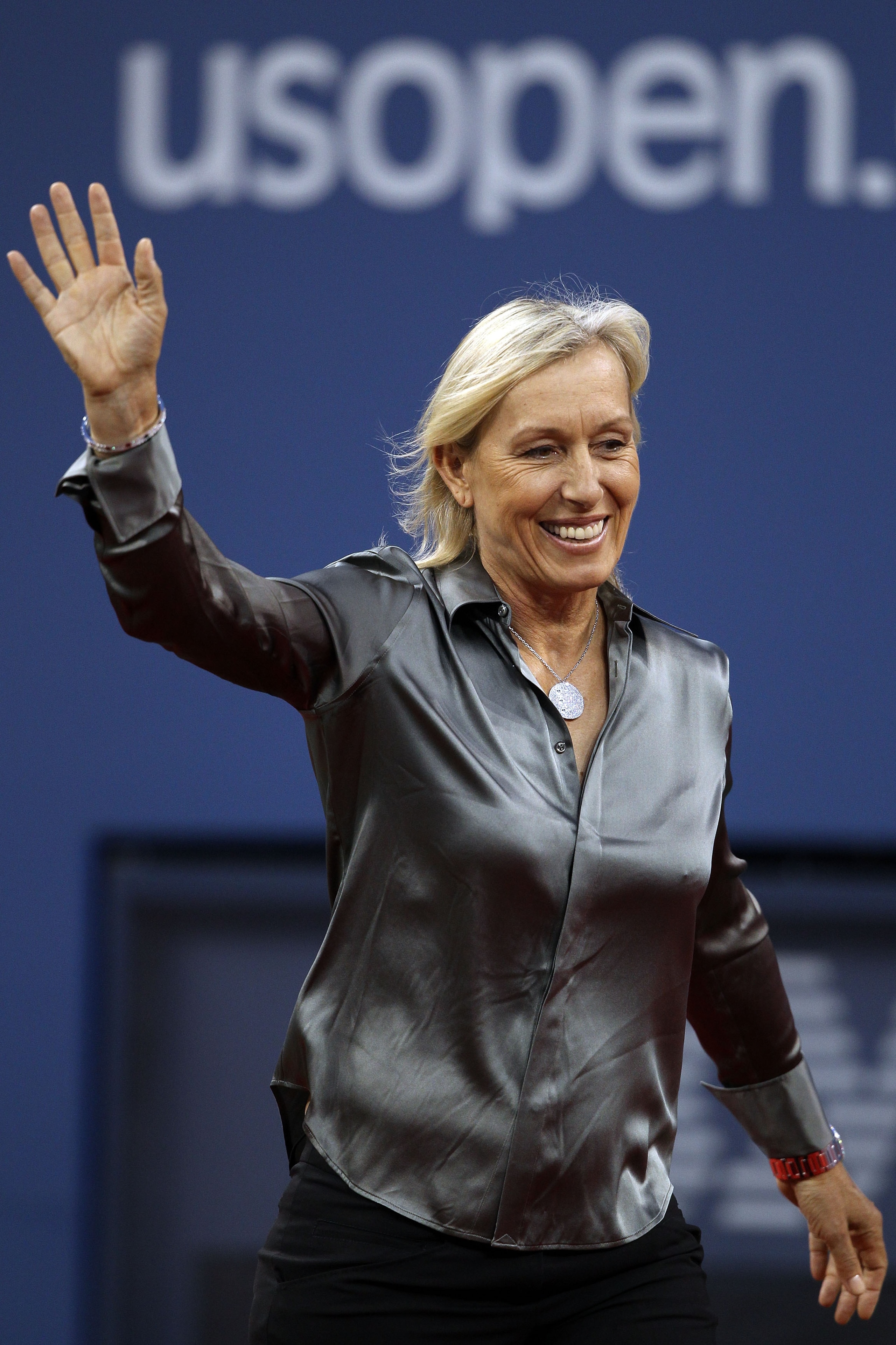 NEW YORK - AUGUST 30:  Tennis great Martina Navratilova waves to the crowd during the opening ceremony of the 2010 U.S. Open at the USTA Billie Jean King National Tennis Center on August 30, 2010 in the Flushing neighborhood of the Queens borough of New Y
