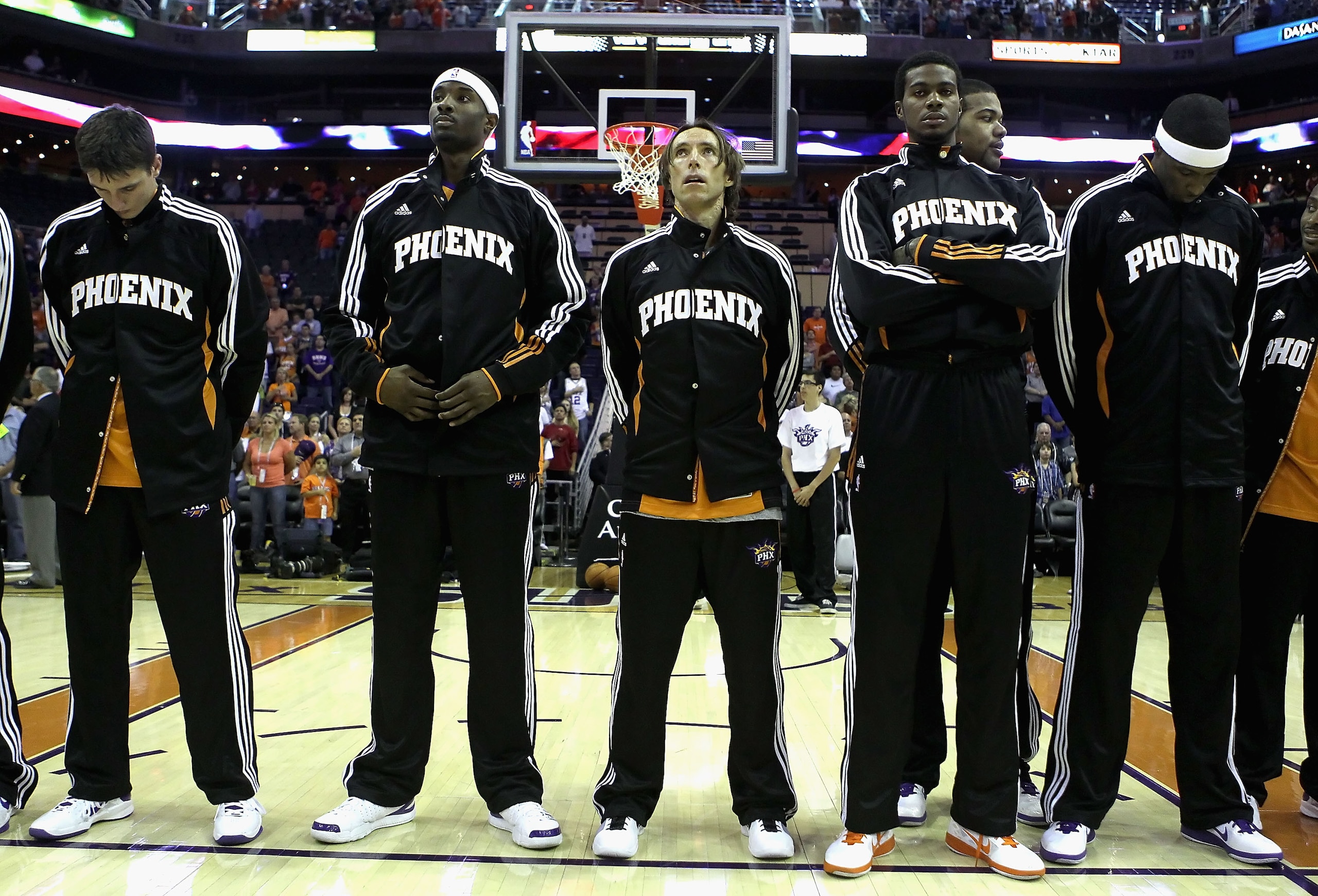 PHOENIX - OCTOBER 12: Steve Nash #13 of the Phoenix Suns stands with teammates for the National Anthem before the preseason NBA game against the Utah Jazz at US Airways Center on October 12, 2010 in Phoenix, Arizona. NOTE TO USER: User expressly acknowle PHOENIX - OCTOBER 12: Steve Nash #13 of the Phoenix Suns stands with teammates for the National Anthem before the preseason NBA game against the Utah Jazz at US Airways Center on October 12, 2010 in Phoenix, Arizona. NOTE TO USER: User expressly acknowle