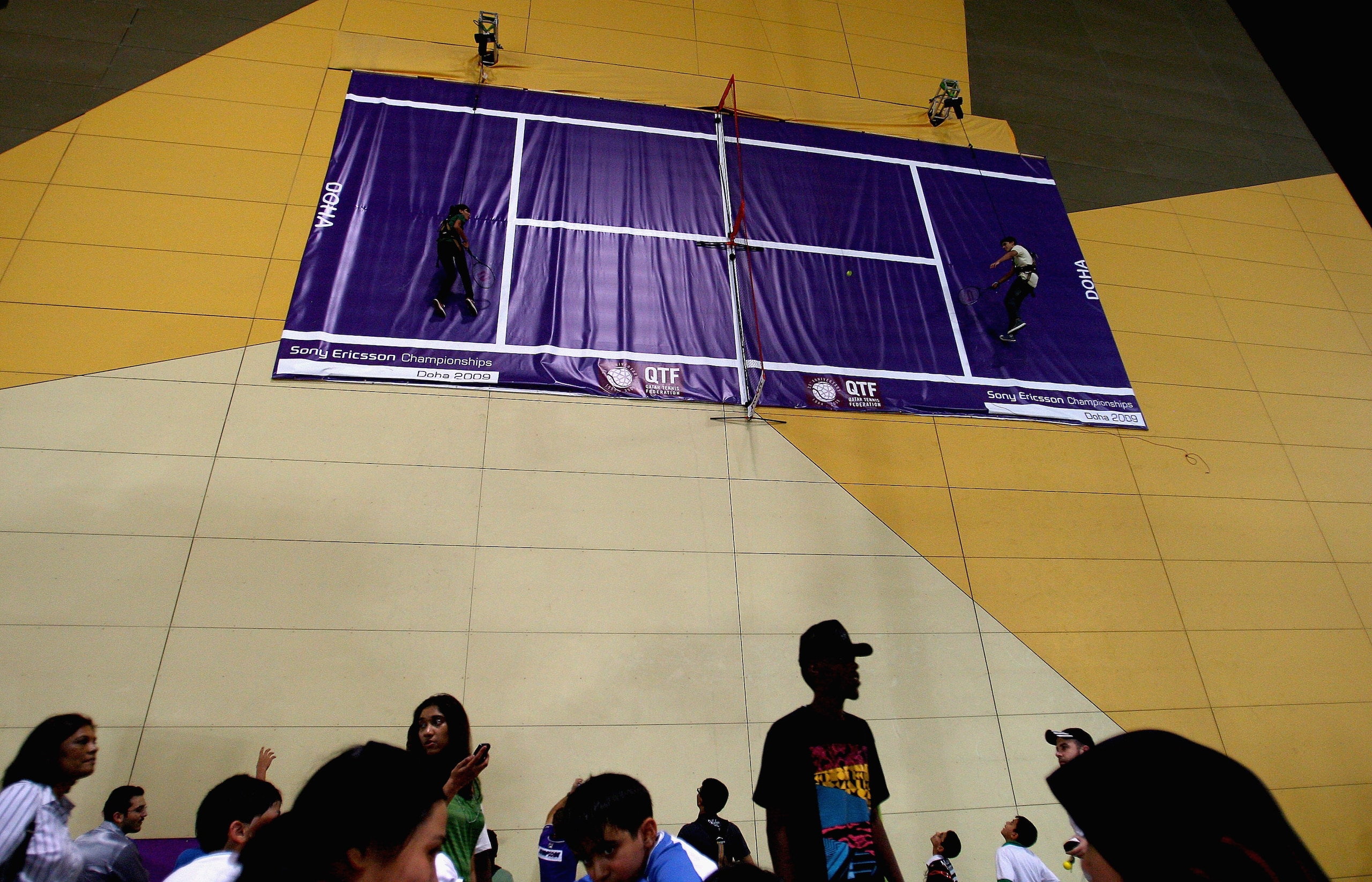 DOHA, QATAR - OCTOBER 29:  Tennis fans play wall tennis  during the Sony Ericsson Championships at the Khalifa Tennis and Squash Complex on October 29, 2009 in Doha, Qatar.  (Photo by Clive Brunskill/Getty Images)