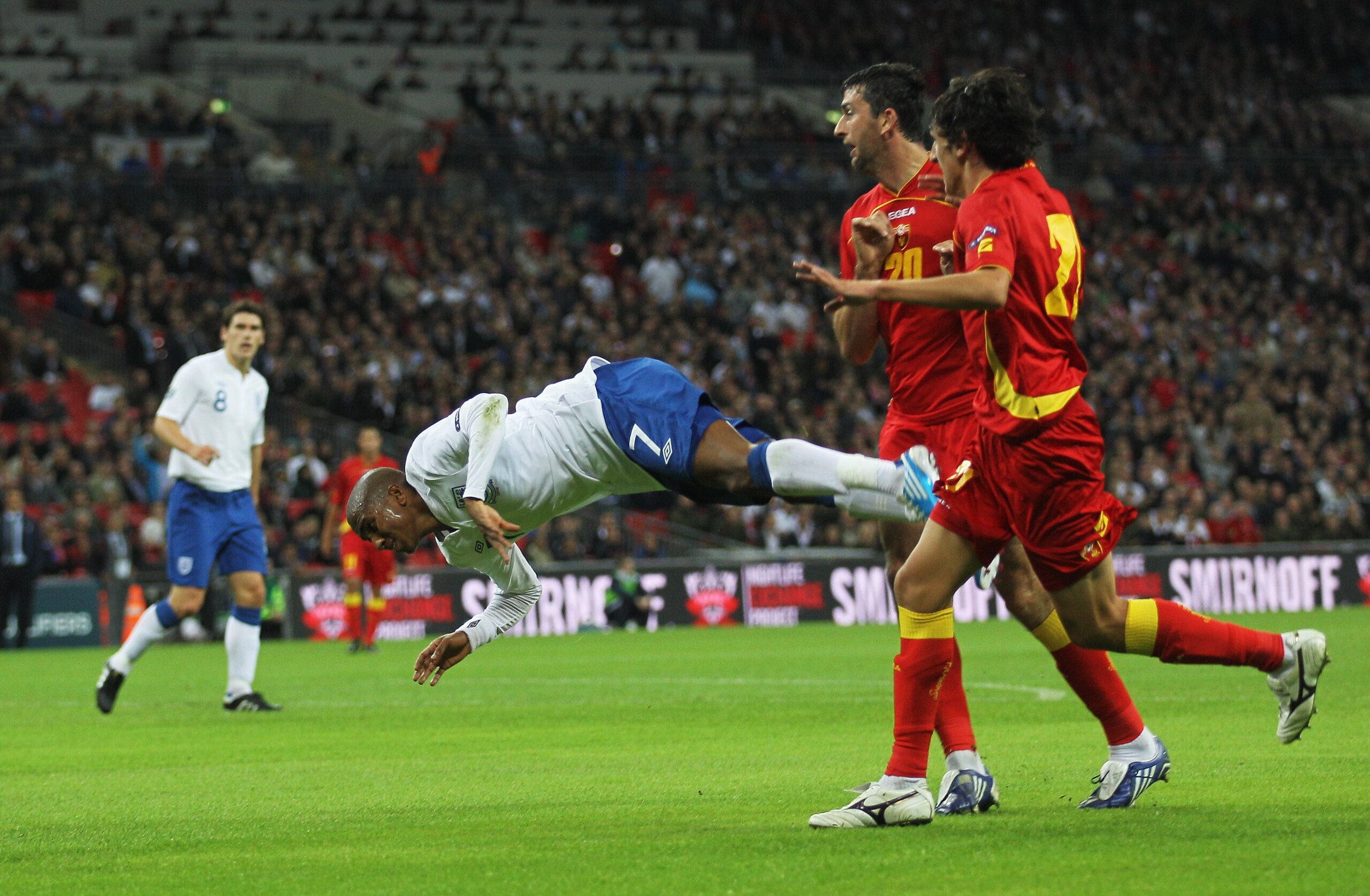 LONDON, ENGLAND - OCTOBER 12: Ashley Young of England goes to ground in the penalty area during the UEFA EURO 2012 Group G Qualifying match between England and Montenegro at Wembley Stadium on October 12, 2010 in London, England. (Photo by Hamish Blair/G LONDON, ENGLAND - OCTOBER 12: Ashley Young of England goes to ground in the penalty area during the UEFA EURO 2012 Group G Qualifying match between England and Montenegro at Wembley Stadium on October 12, 2010 in London, England. (Photo by Hamish Blair/G