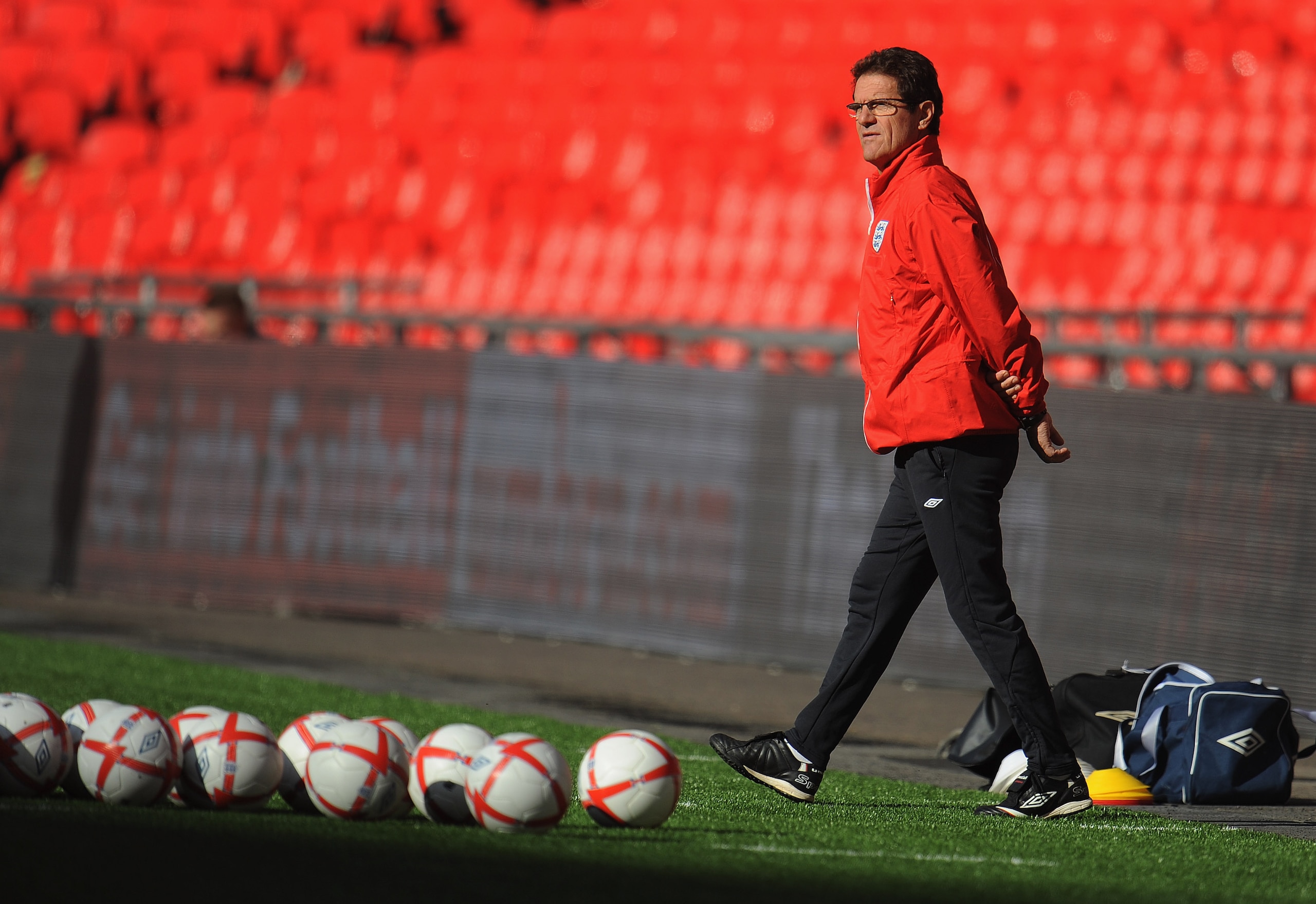 LONDON, ENGLAND - OCTOBER 11: England manager Fabio Capello looks on during the England training session at Wembley Stadium on October 11, 2010 in London, England. (Photo by Michael Regan/Getty Images) LONDON, ENGLAND - OCTOBER 11: England manager Fabio Capello looks on during the England training session at Wembley Stadium on October 11, 2010 in London, England. (Photo by Michael Regan/Getty Images)