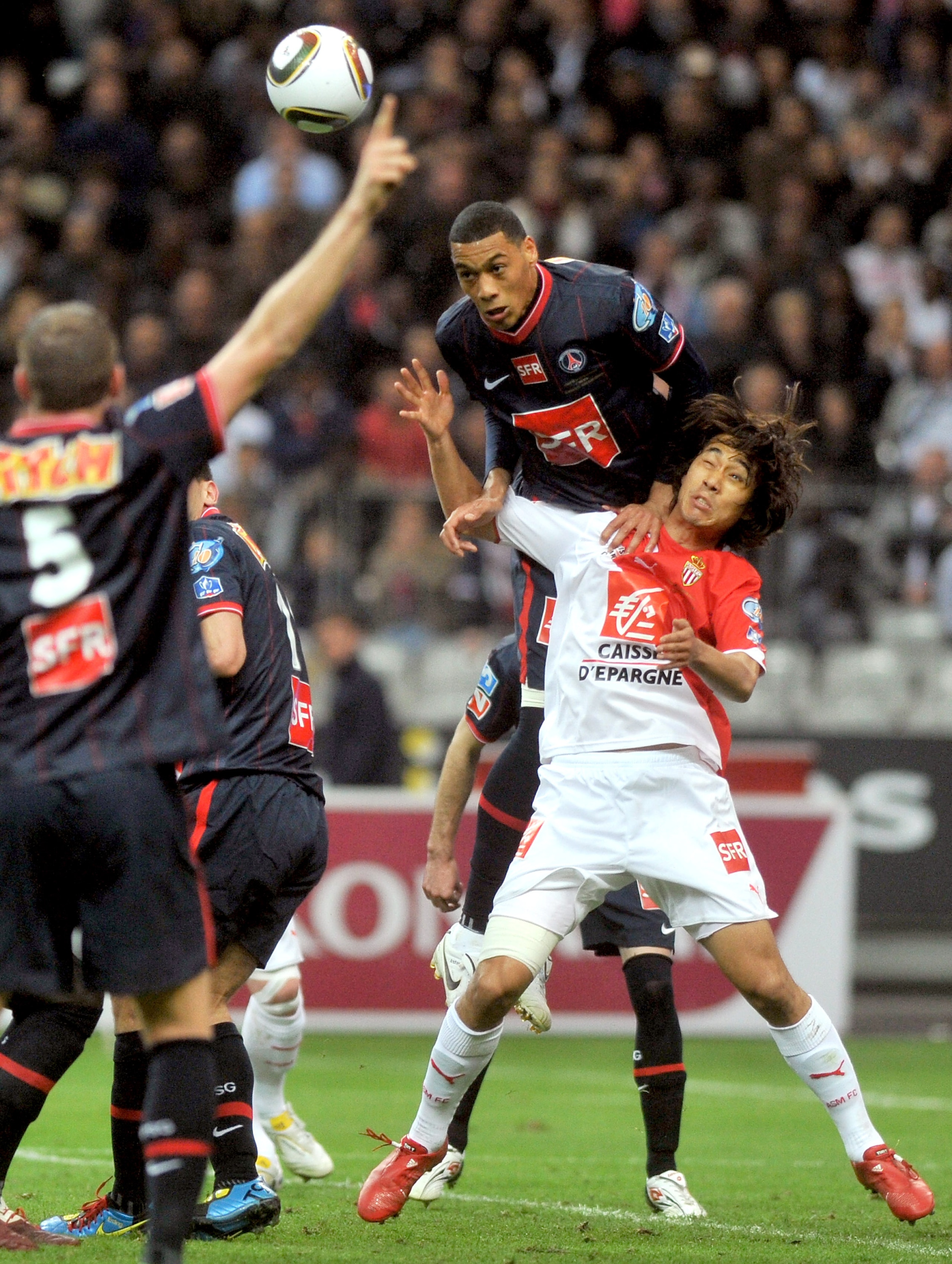 PARIS - MAY 01: Paris Saint-Germain's French striker Guillaume Hoarau battles for the ball with A.S Monaco striker Chu Young Park during the French football cup final at Stade de France on May 1, 2010 in Paris, France. Paris Saint Germain won 1-0. (Photo 