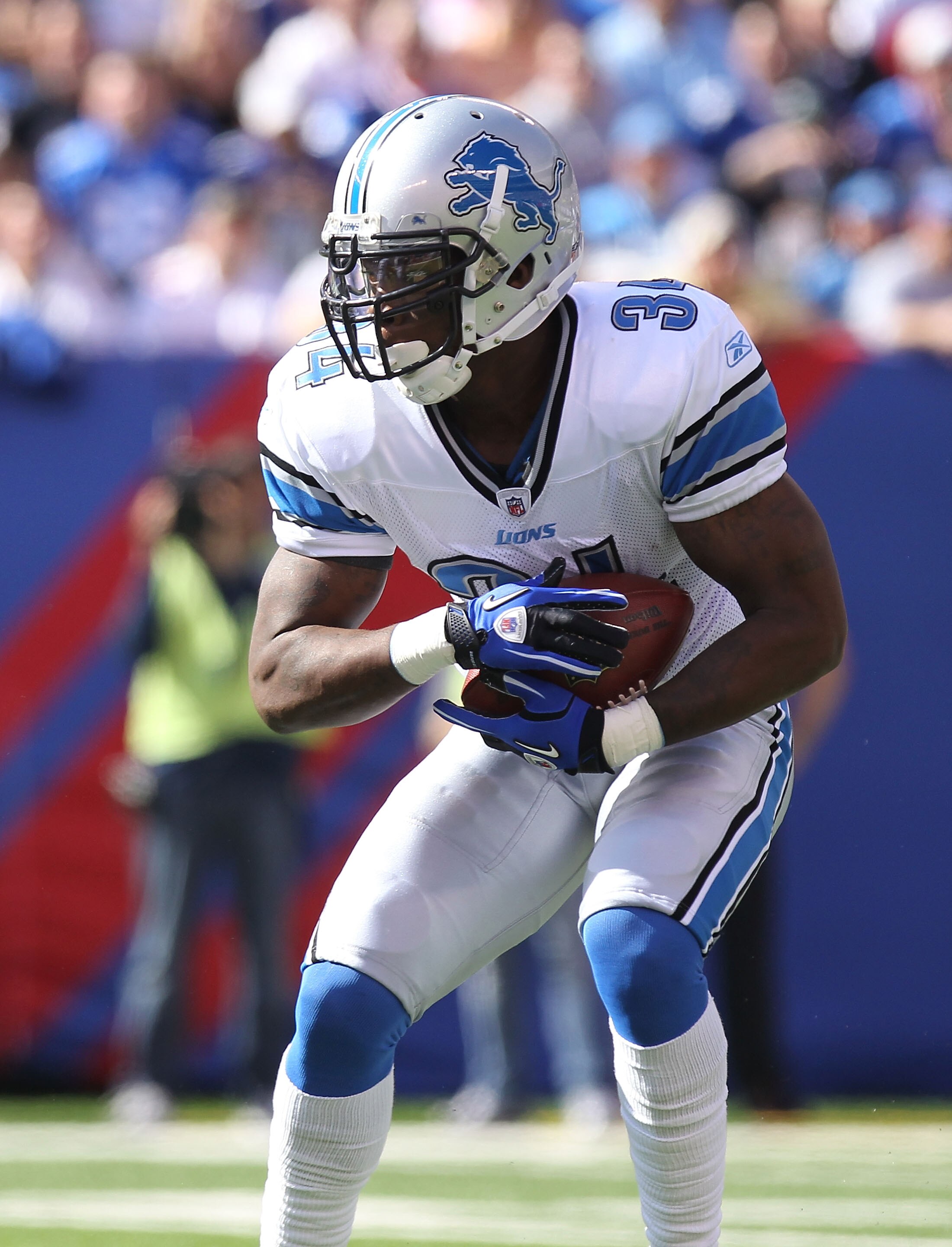 EAST RUTHERFORD, NJ - OCTOBER 17: Kevin Smith #34 of the Detroit Lions against the New York Giants at New Meadowlands Stadium on October 17, 2010 in East Rutherford, New Jersey.  (Photo by Nick Laham/Getty Images)