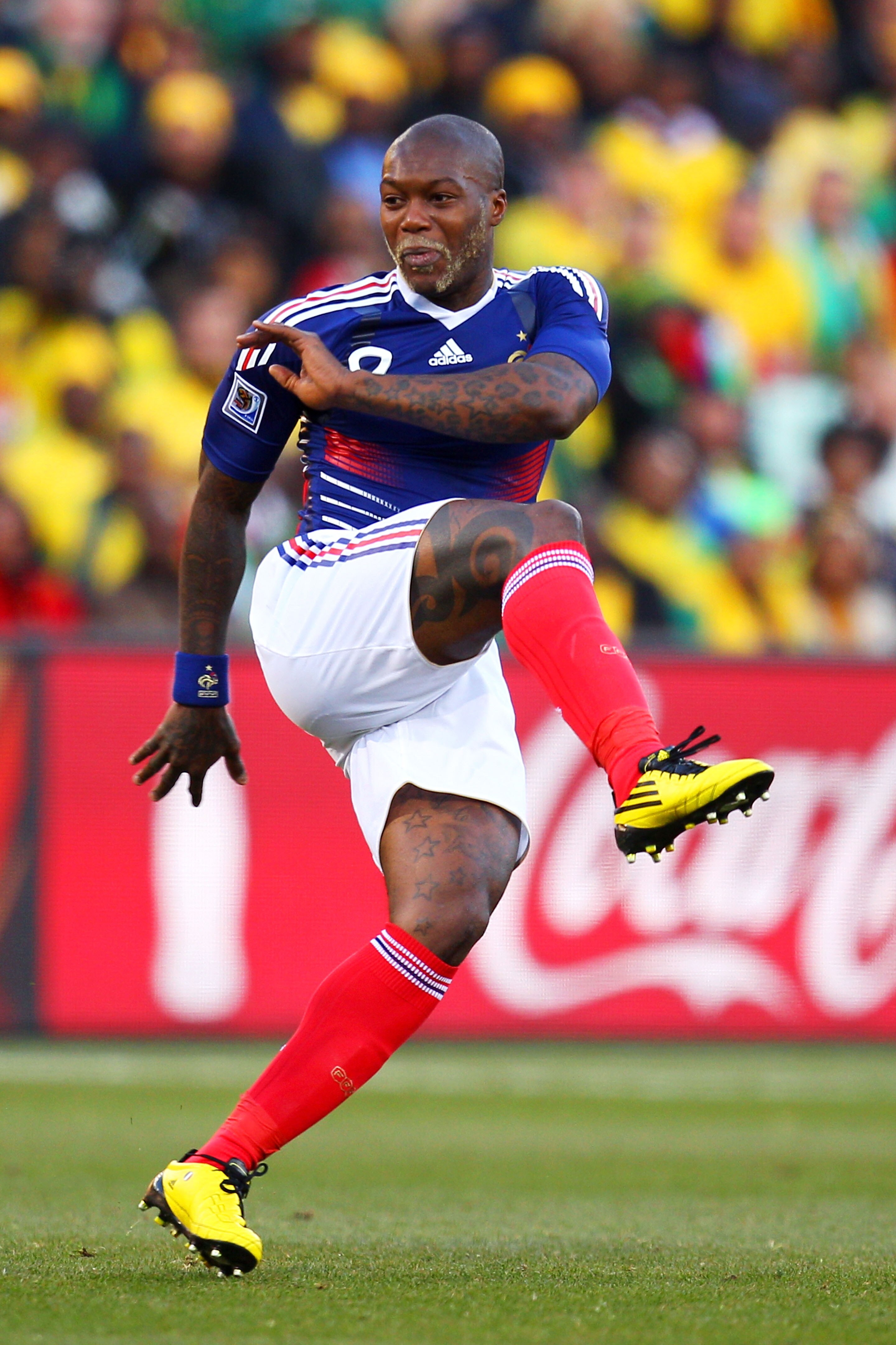 BLOEMFONTEIN, SOUTH AFRICA - JUNE 22: Djibril Cisse of France in action during the 2010 FIFA World Cup South Africa Group A match between France and South Africa at the Free State Stadium on June 22, 2010 in Mangaung/Bloemfontein, South Africa.  (Photo by