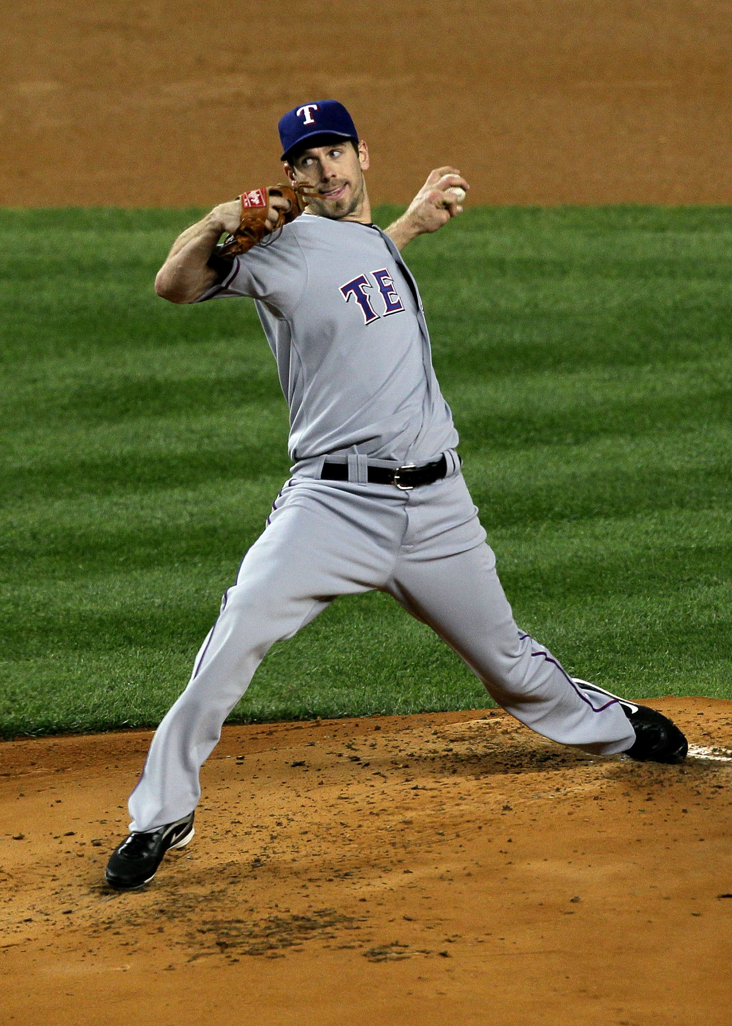 NEW YORK - OCTOBER 18:  Cliff Lee #33 of the Texas Rangers throws a pitch against the New York Yankees in Game Three of the ALCS during the 2010 MLB Playoffs at Yankee Stadium on October 18, 2010 in New York, New York.  (Photo by Jim McIsaac/Getty Images)