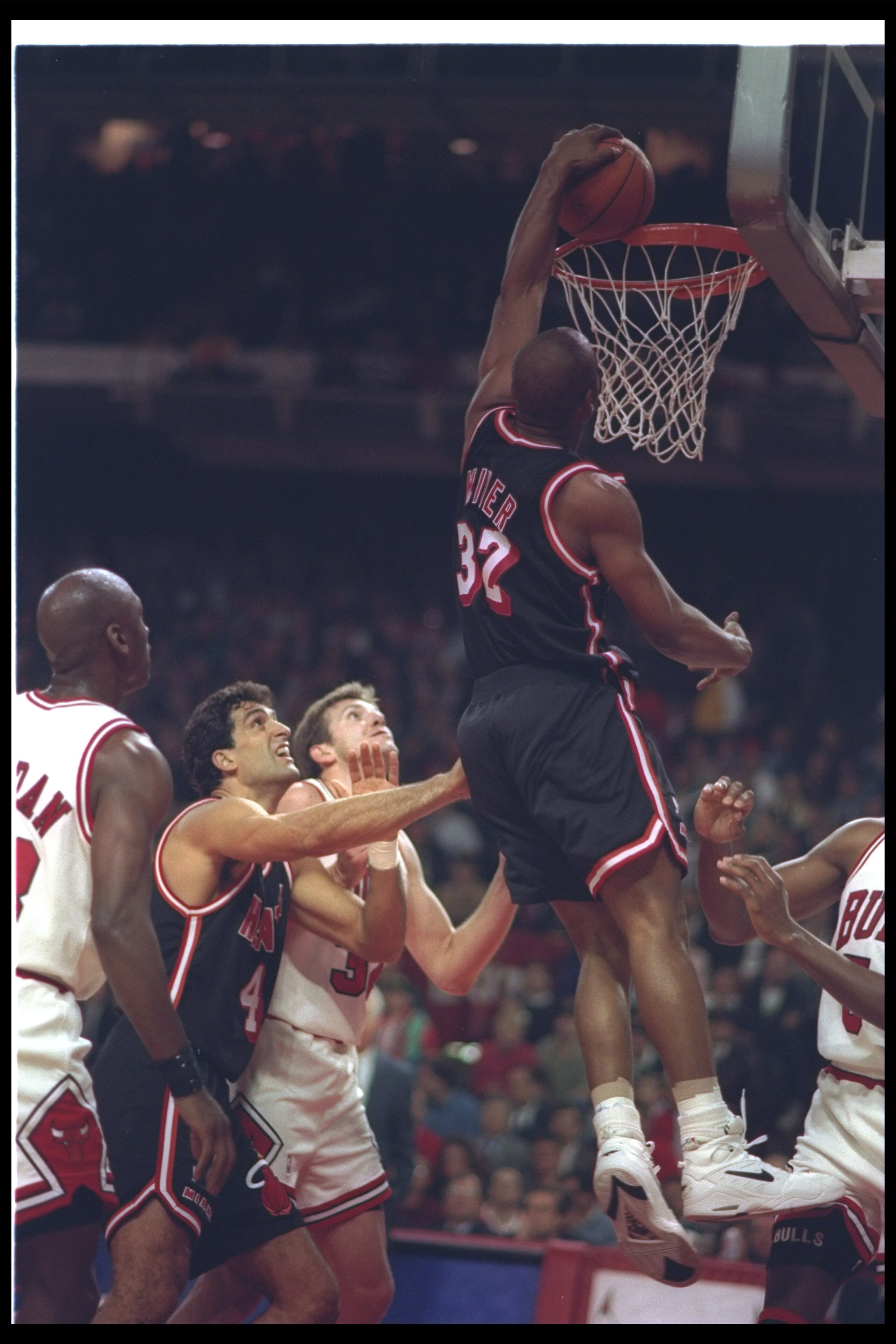 14 Apr 1993:  Guard Harold Miner #32 of the Miami Heat sinks the ball during a game against the Chicago Bulls at the United Center in Chicago, Illinois. Mandatory Credit: Jonathan Daniel  /Allsport