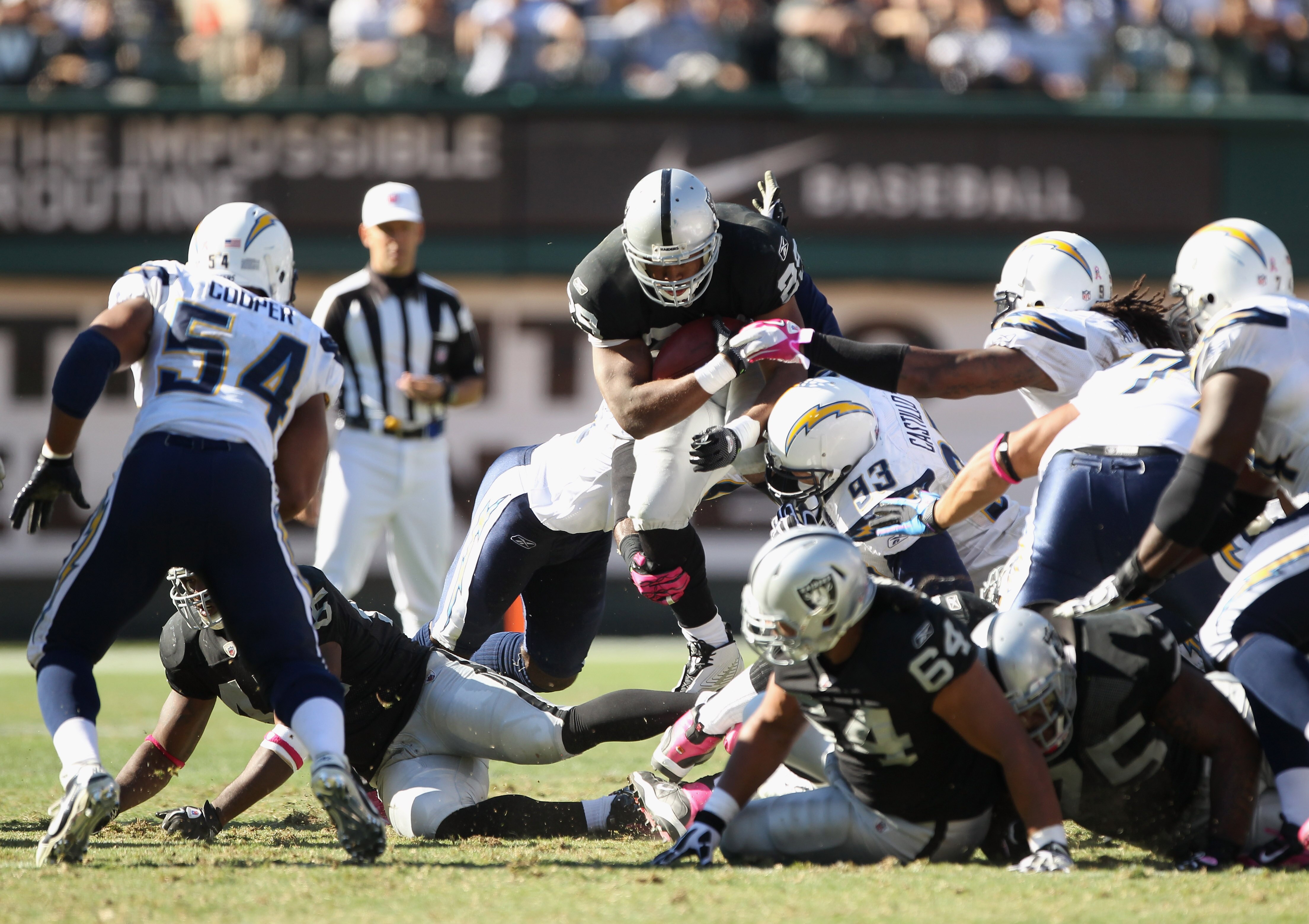 OAKLAND, CA - OCTOBER 10:  Michael Bush #29 of the Oakland Raiders runs with the ball against the San Diego Chargers at Oakland-Alameda County Coliseum on October 10, 2010 in Oakland, California.  (Photo by Ezra Shaw/Getty Images)