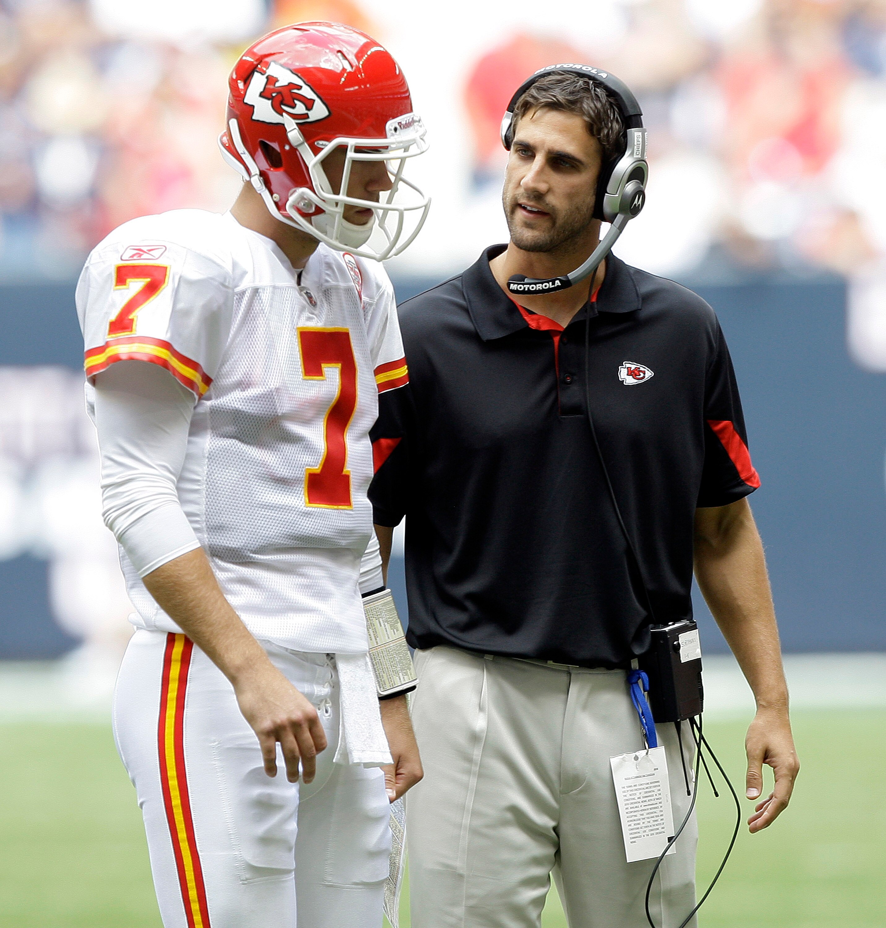 HOUSTON - OCTOBER 17:  Quarterback Matt Cassel #7 of the Kasnas City Chiefs talks with quarterback coach Nick Sirianni during a game against the Houston Texans at Reliant Stadium on October 17, 2010 in Houston, Texas.  (Photo by Bob Levey/Getty Images)