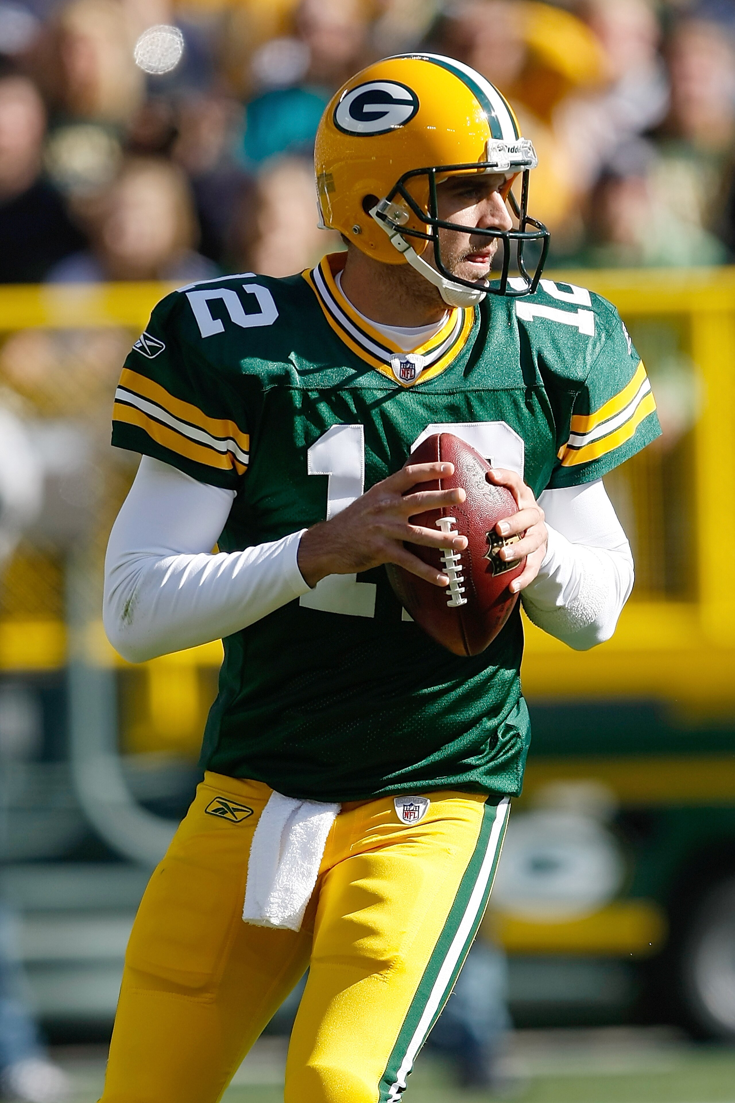 GREEN BAY, WI - OCTOBER 17: Aaron Rogers #12 of the Green Bay Packers passes against the Miami Dolphins at Lambeau Field on October 17, 2010 in Green Bay, Wisconsin. (Photo by Scott Boehm/Getty Images)