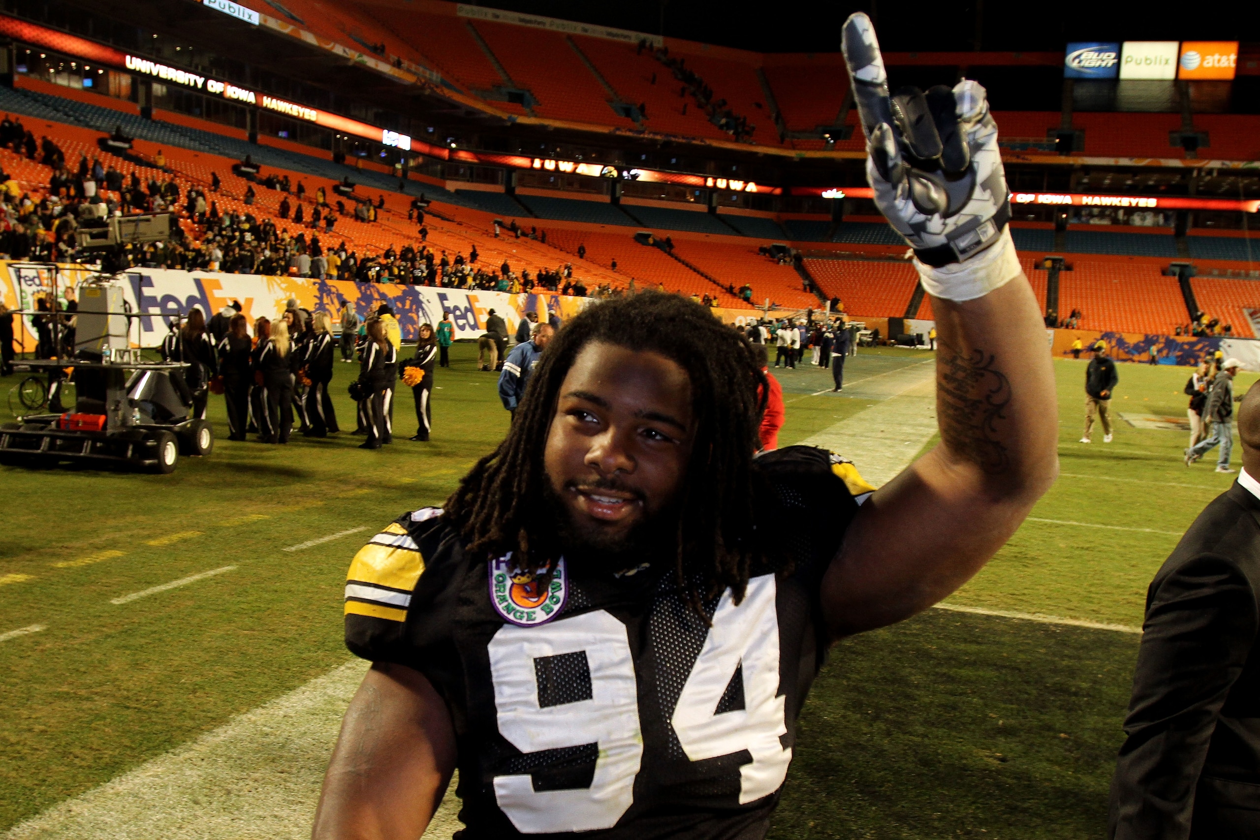 MIAMI GARDENS, FL - JANUARY 05:  Adrian Clayborn #94 of the Iowa Hawkeyes celebrates as he walks off the field after their 24-14 win against the Georgia Tech Yellow Jackets during the FedEx Orange Bowl at Land Shark Stadium on January 5, 2010 in Miami Gar