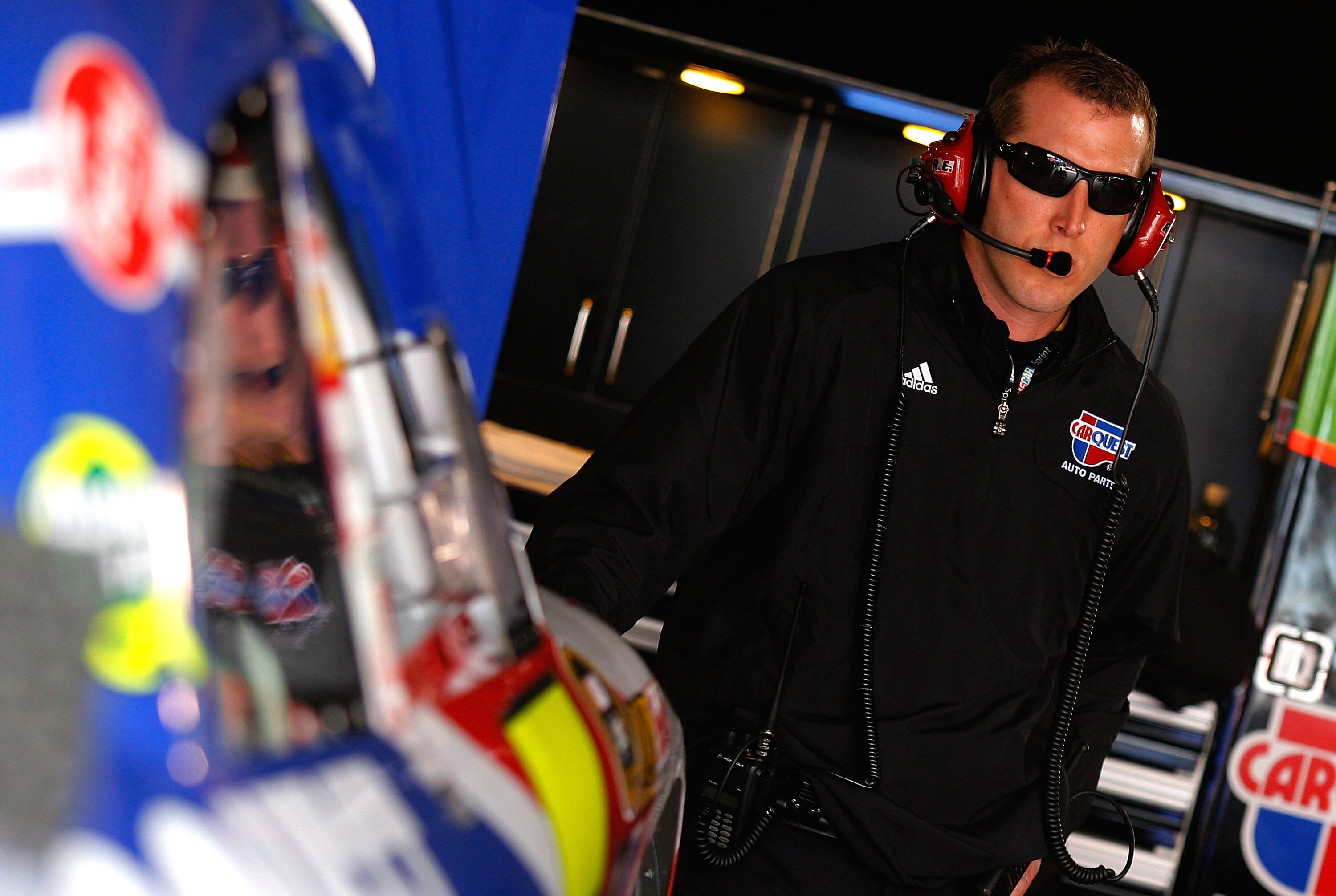 MARTINSVILLE, VA - MARCH 26:  Alan Gustafson, crew chief for Mark Martin (not pictured), driver of the #5 CARQUEST/GoDaddy.com Chevrolet stands in the garage area during practice for the NASCAR Sprint Cup Series Goody's Fast Pain Relief 500 at Martinsvill
