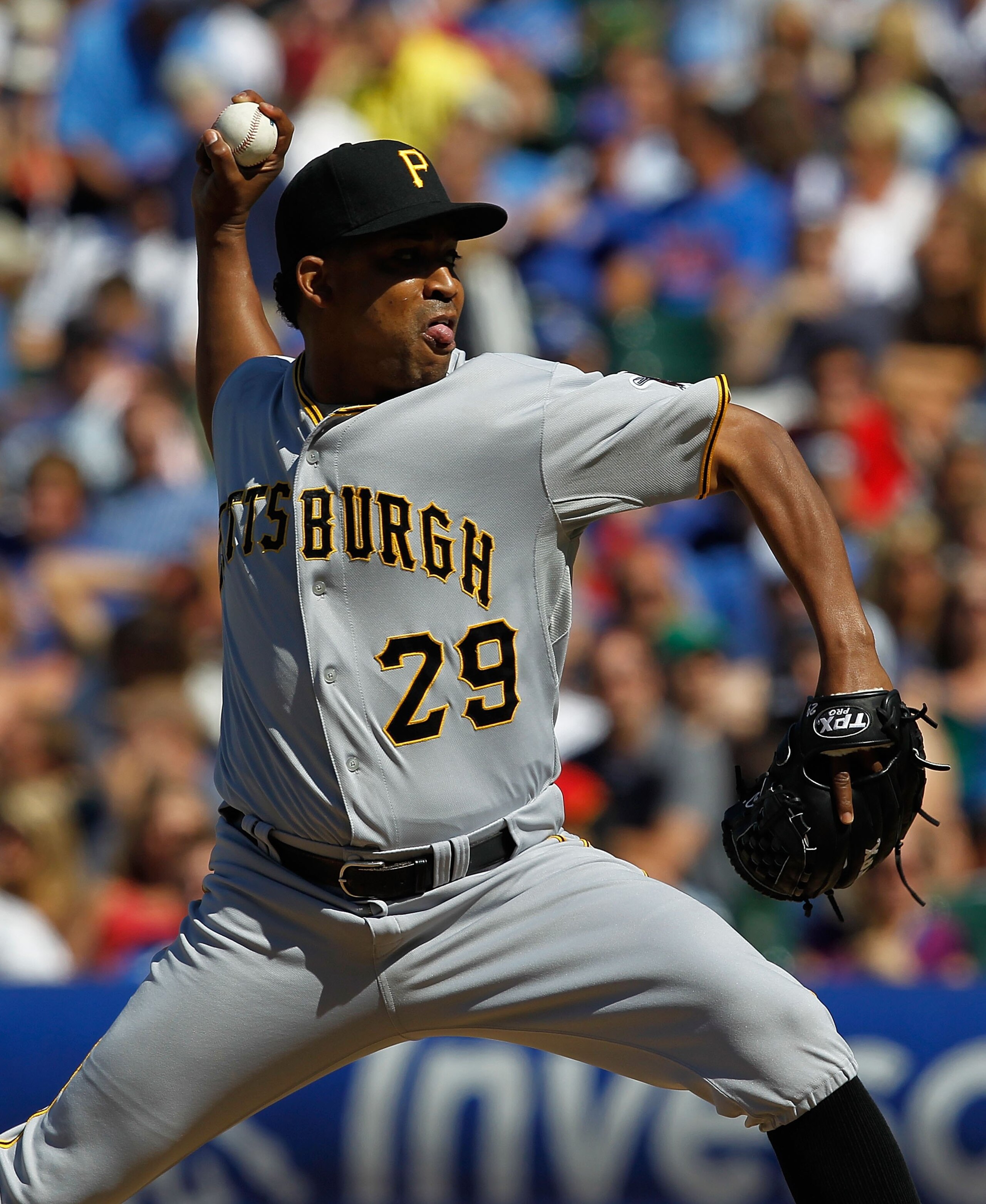 CHICAGO - JUNE 30: Octavio Dotel #29 of the Pittsburgh Pirates pitches in the 9th inning on his way to a save against the Chicago Cubs at Wrigley Field on June 30, 2010 in Chicago, Illinois. The Pirates defeated the Cubs 2-0. (Photo by Jonathan Daniel/Get