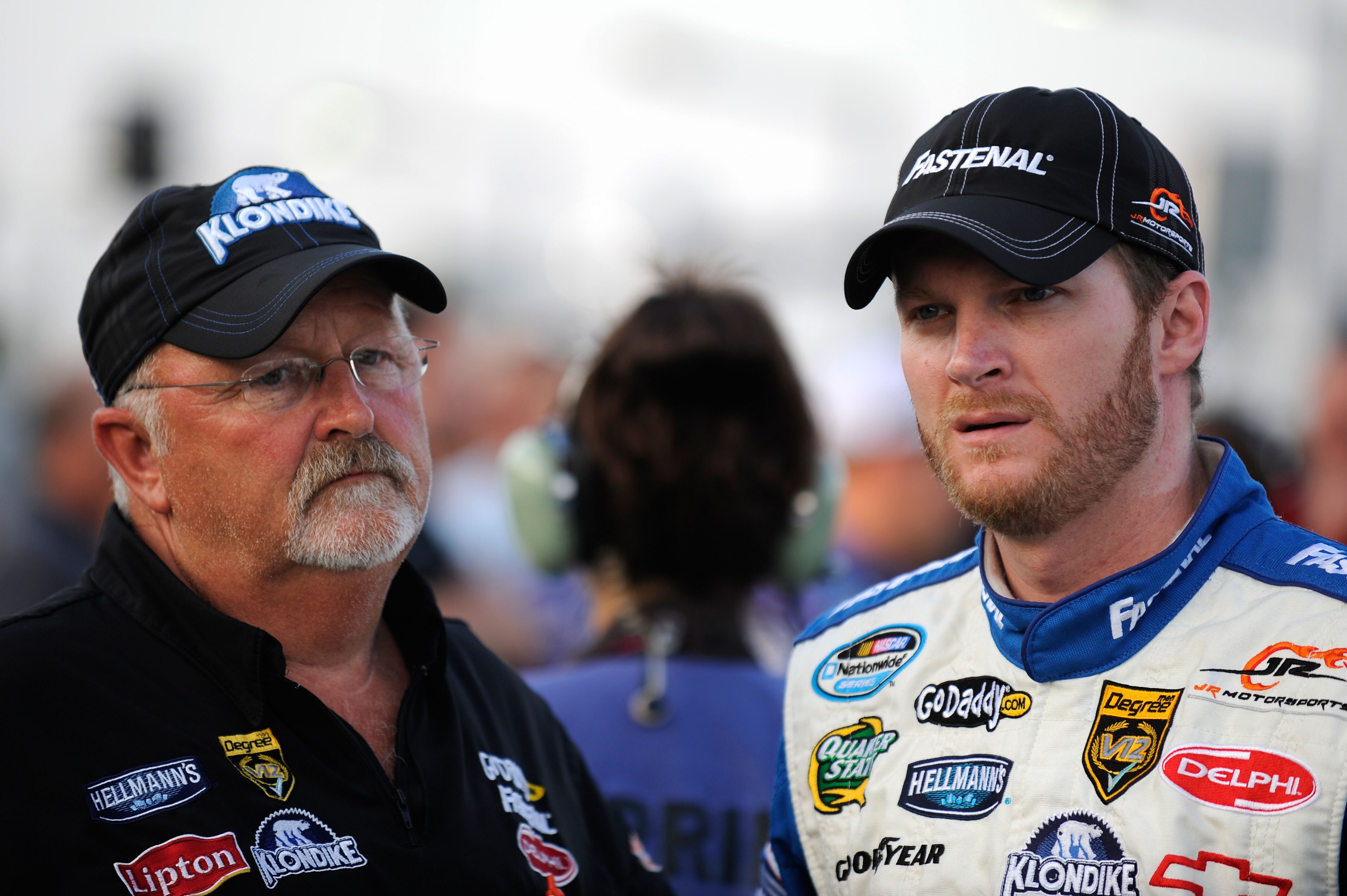 DAYTONA BEACH, FL - JULY 03: Tony Eury Sr. (L), crew chief of the #88 Klondike Chevrolet, speaks with Dale Earnhardt Jr. (R), driver of the #5 Fastenal Chevrolet, prior to the start of the NASCAR Nationwide Series Subway Jalapeno 250 at Daytona Internatio
