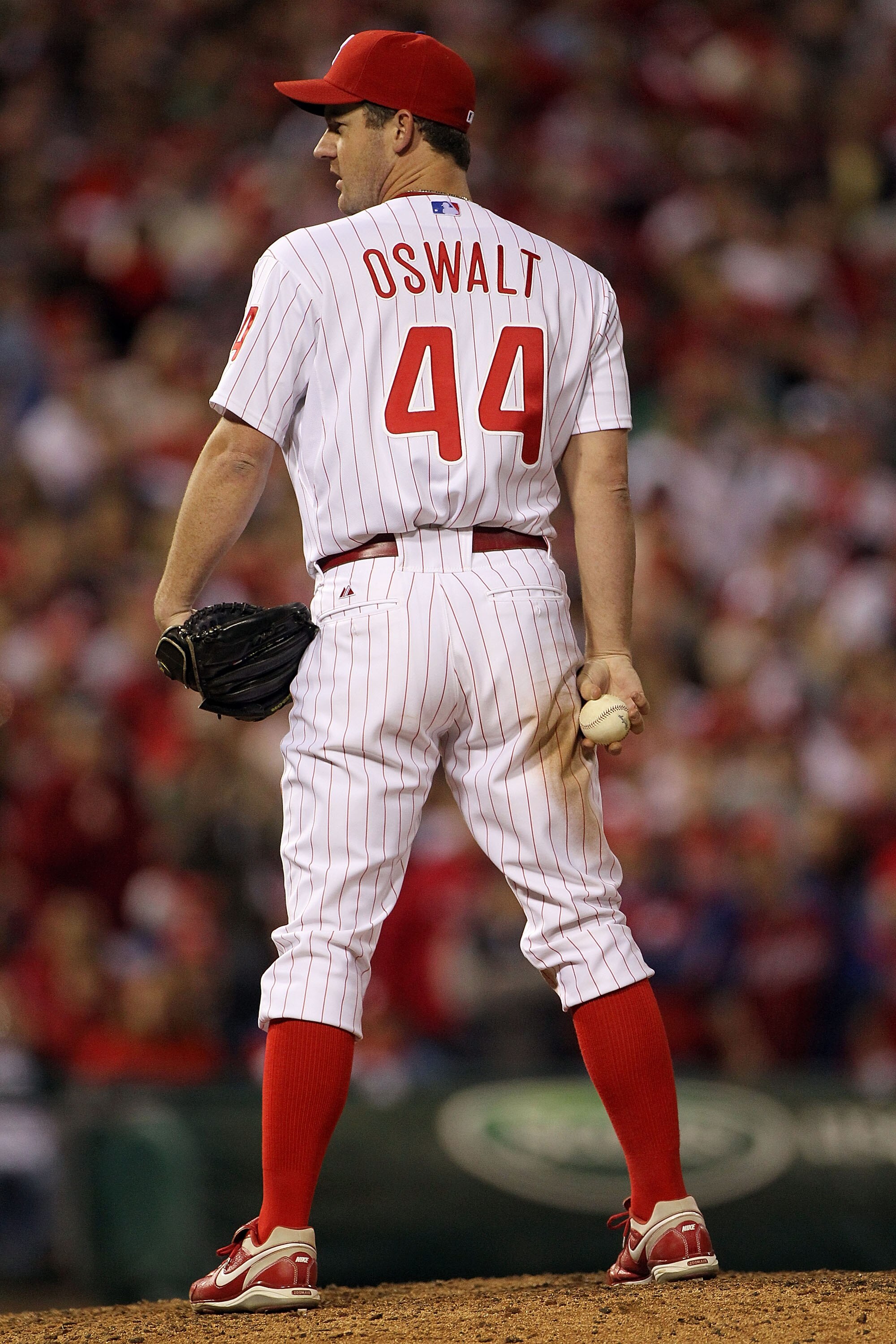 PHILADELPHIA - OCTOBER 17:  Pitcher Roy Oswalt #44 of the Philadelphia Phillies looks on against the San Francisco Giants in Game Two of the NLCS during the 2010 MLB Playoffs at Citizens Bank Park on October 17, 2010 in Philadelphia, Pennsylvania.  (Photo