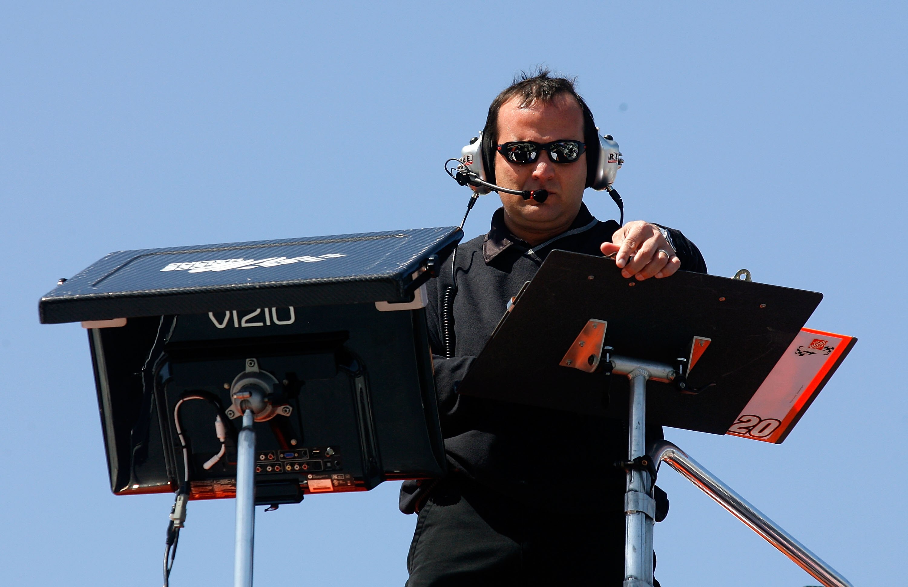 MARTINSVILLE, VA - MARCH 27:  Greg Zipadelli, crew chief for Joey Logano (not pictured), driver of the #20 Home Depot, works on top of the hauler during practice for the NASCAR Sprint Cup Series Goody's Fast Pain Relief 500 at Martinsville Speedway on Mar