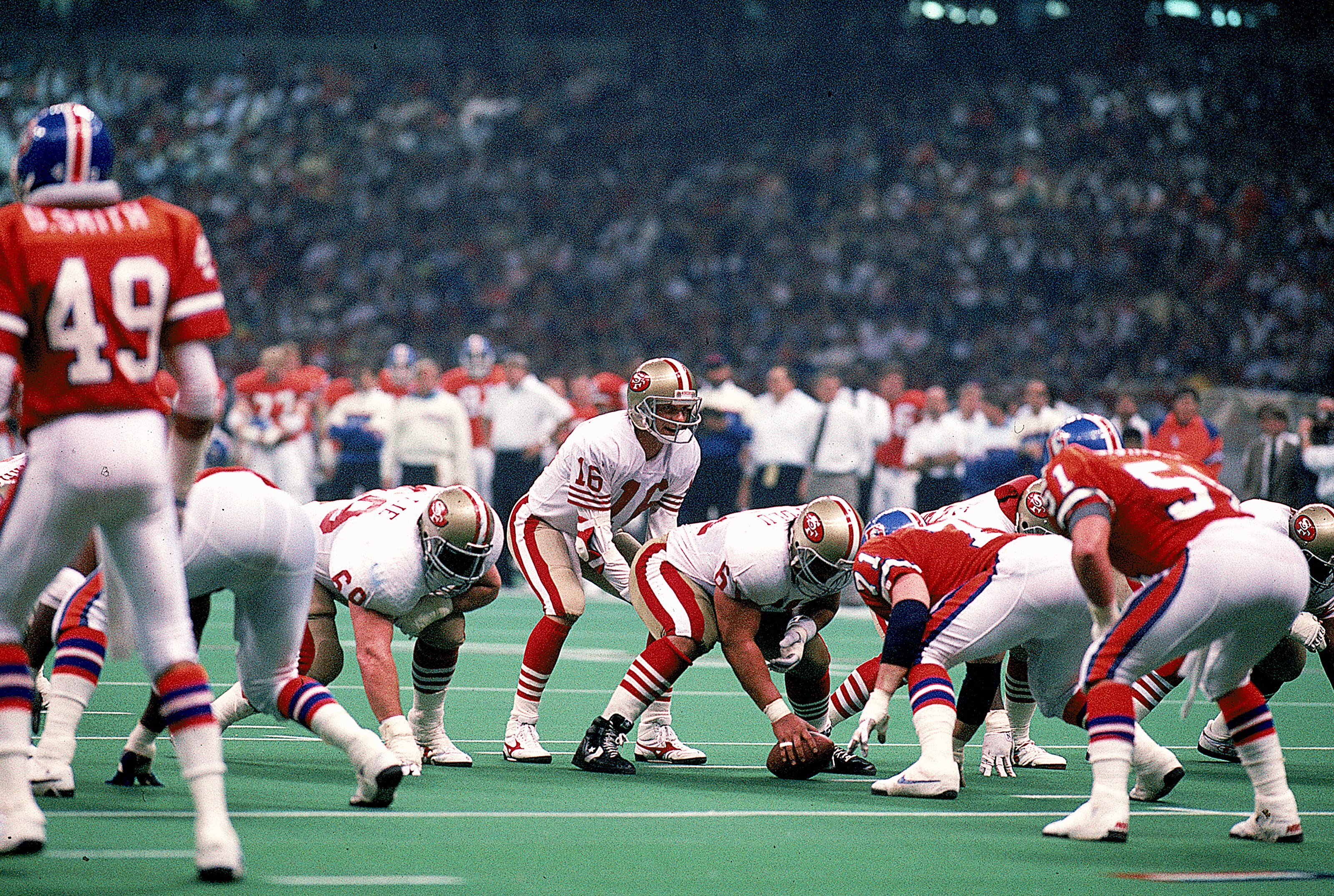 28 Jan 1990:  Quarterback Joe Montana #16 of the San Francisco 49ers in action during the NFL Super Bowl XXIV Game against Denver Broncos at the Louisiana Superdome in New Orleans, Louisiana. The 49ers defeated the Broncos 55-10. Mandatory Credit: Rick St