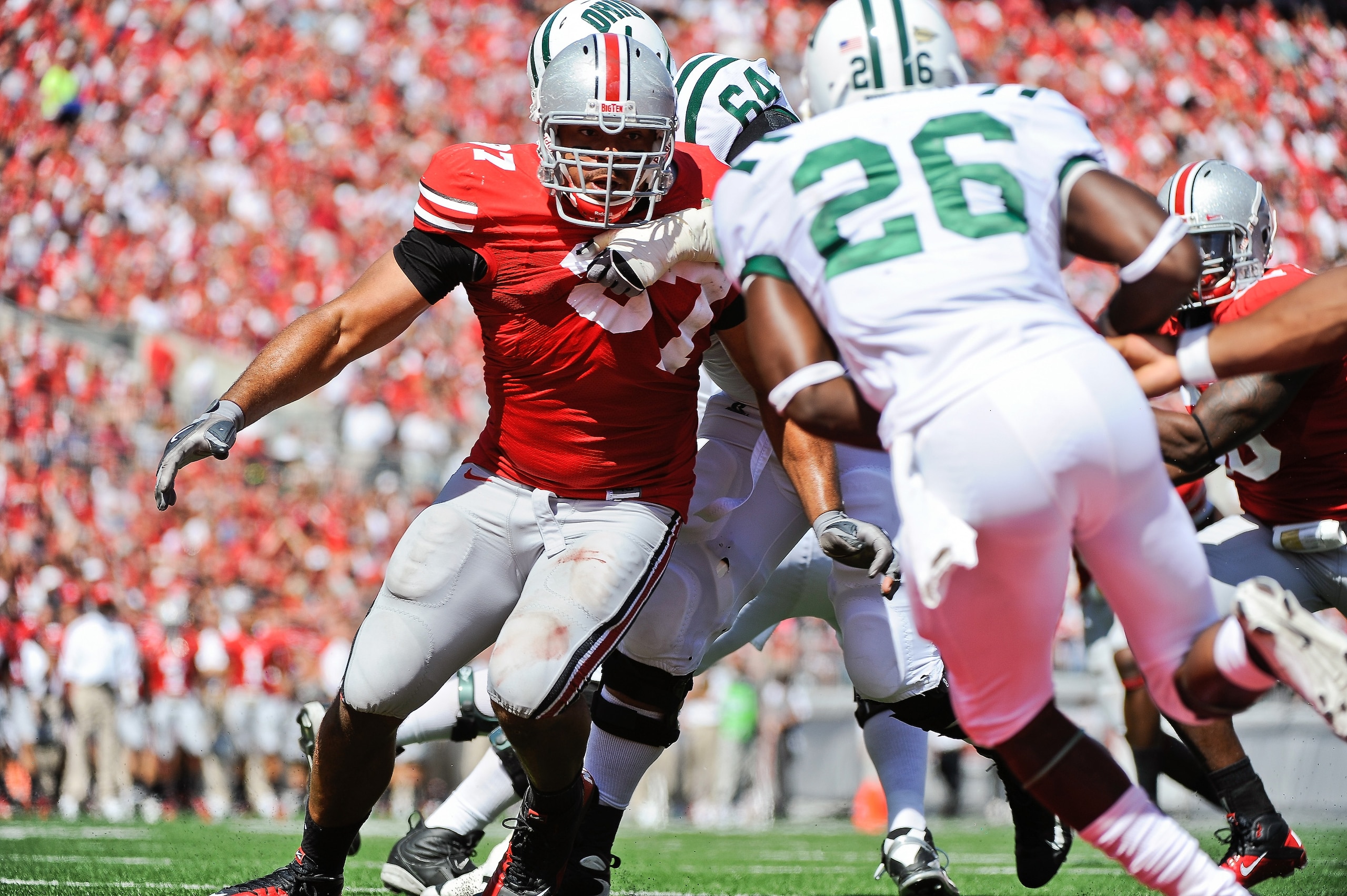 COLUMBUS, OH - SEPTEMBER 18:  Cameron Heyward #97 of the Ohio State Buckeyes chases after the ballcarrier against the Ohio Bobcats at Ohio Stadium on September 18, 2010 in Columbus, Ohio.  (Photo by Jamie Sabau/Getty Images)