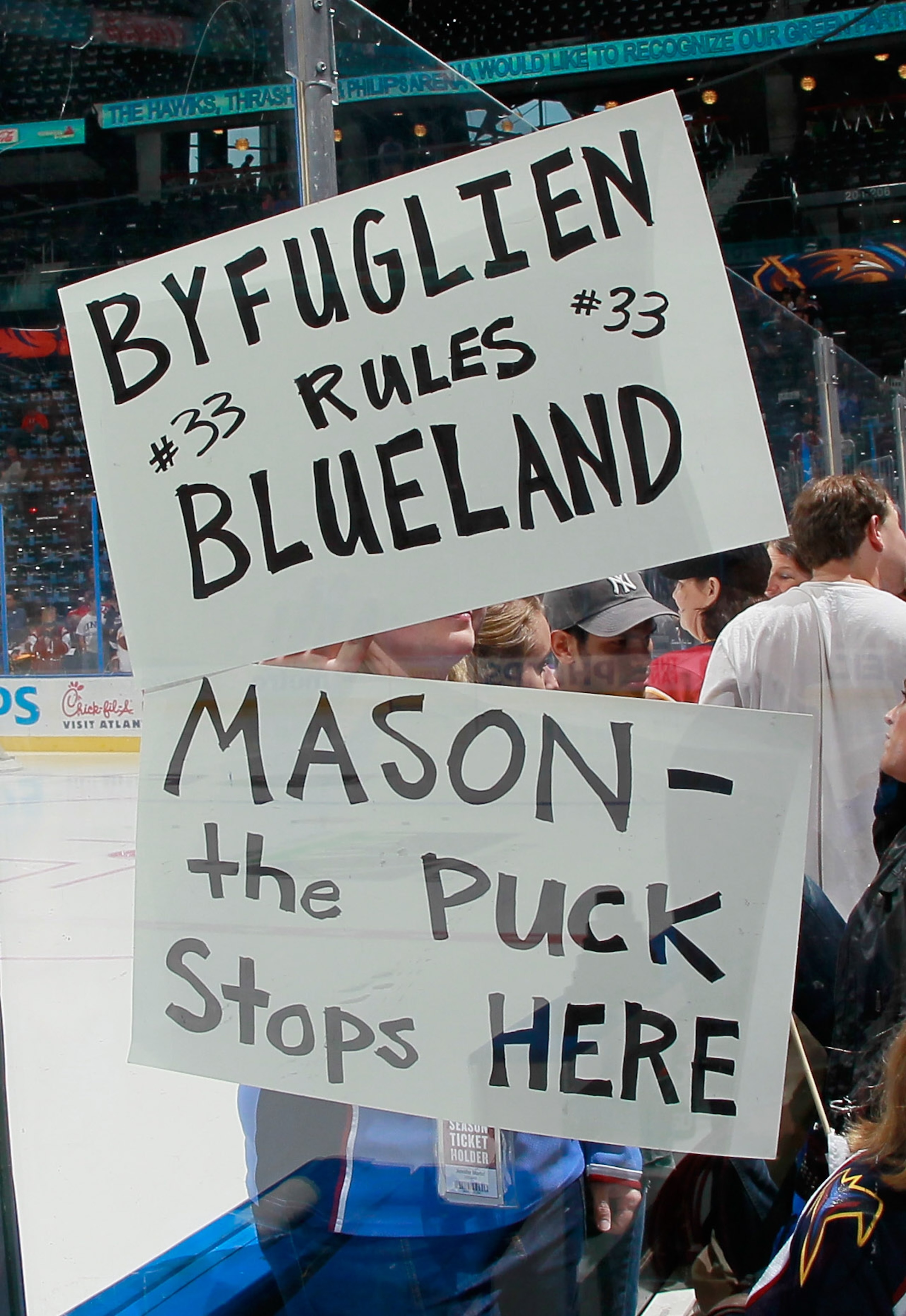 ATLANTA - OCTOBER 08:  Fans of the Atlanta Thrashers hold up signs before facing the Washington Capitals at Philips Arena on October 8, 2010 in Atlanta, Georgia.  (Photo by Kevin C. Cox/Getty Images)