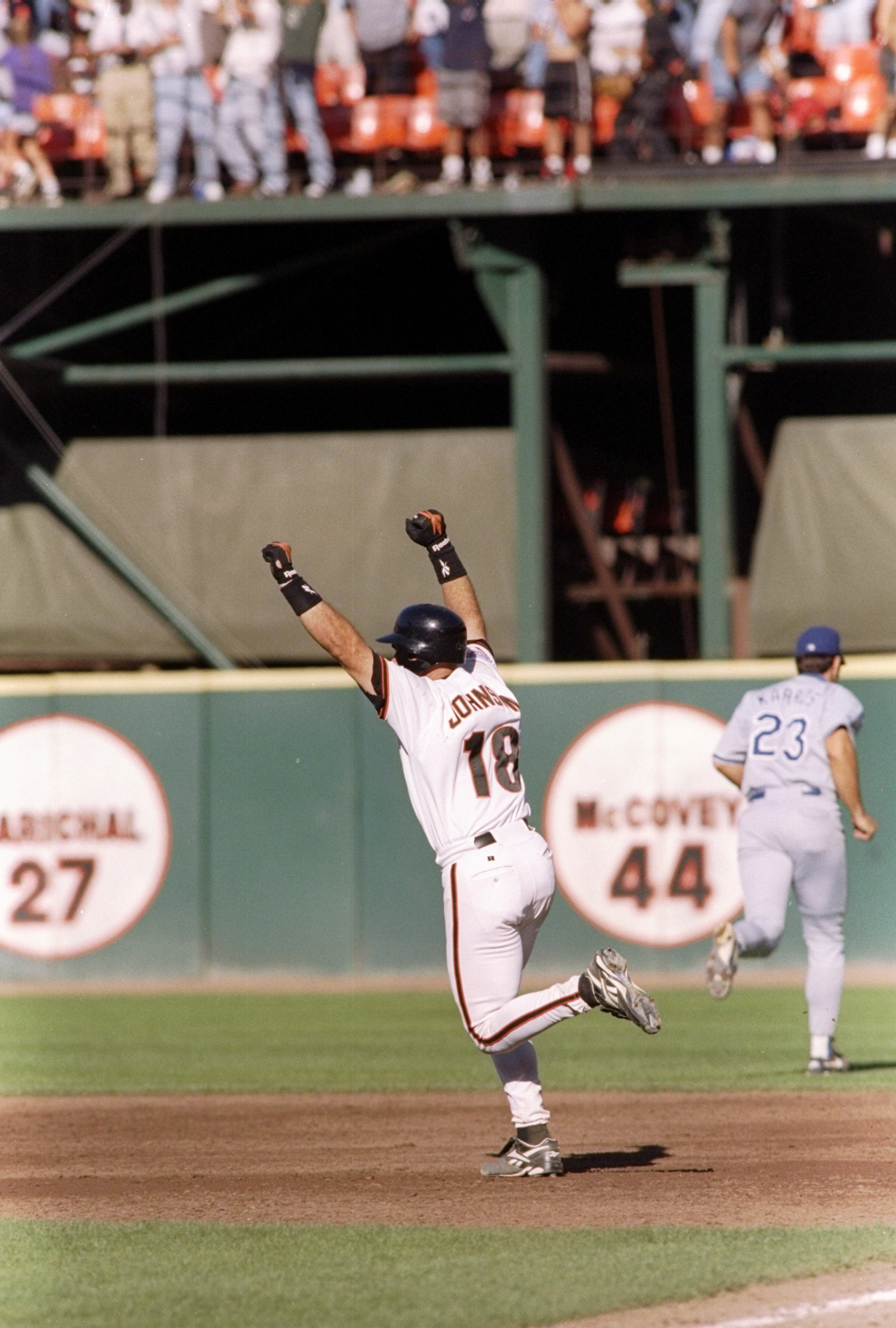 18 Sep 1997: Brian Johnson of the San Francisco Giants celebrates his home run during a game against the Los Angeles Dodgers at 3Com Park in San Francisco, California. The Giants won the game, 6-5.