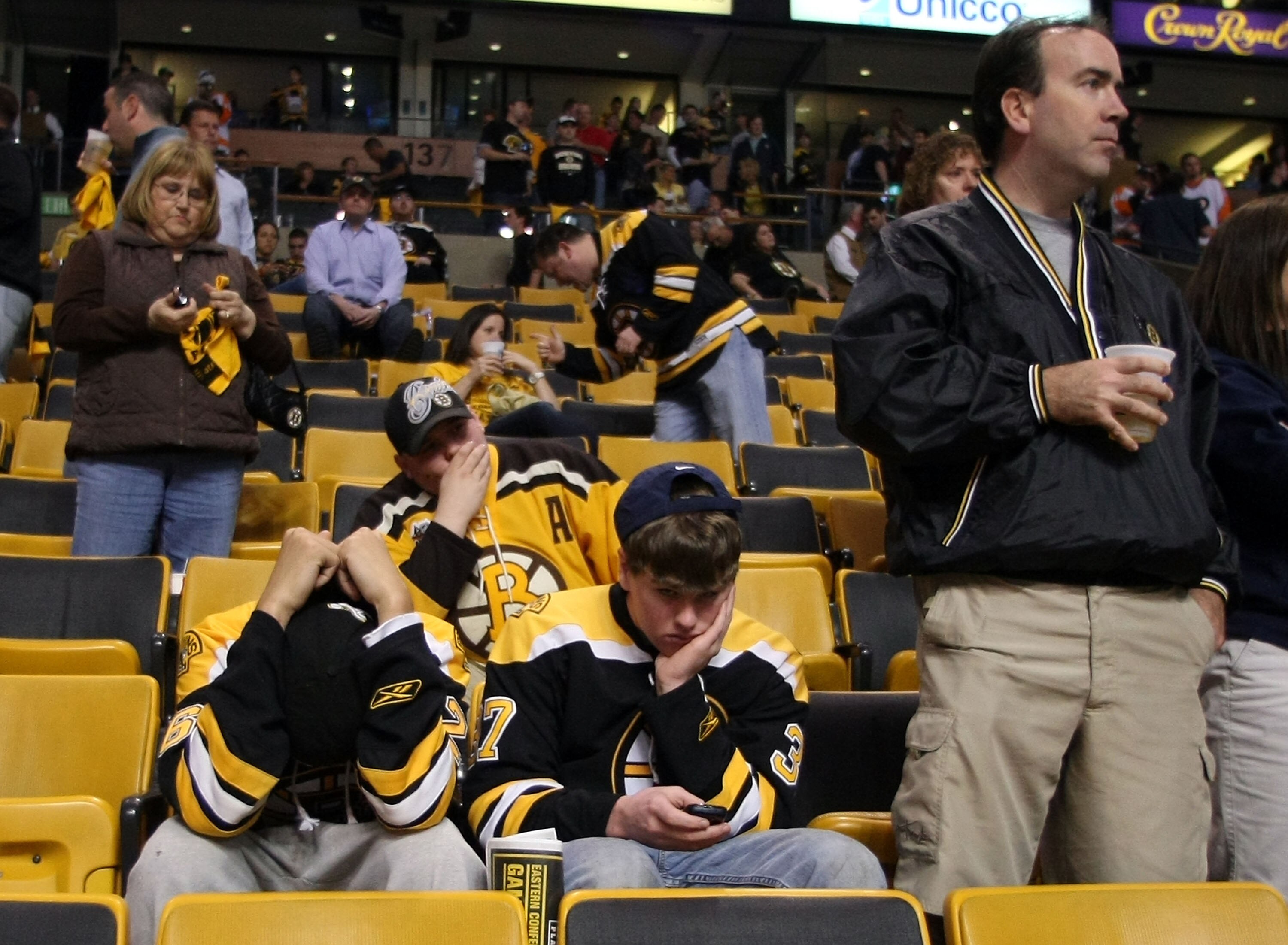 BOSTON - MAY 14:  Boston Bruins fans react after their team lost to the Philadelphia Flyers in Game Seven of the Eastern Conference Semifinals during the 2010 NHL Stanley Cup Playoffs at TD Garden on May 14, 2010 in Boston, Massachusetts. The Flyers defea