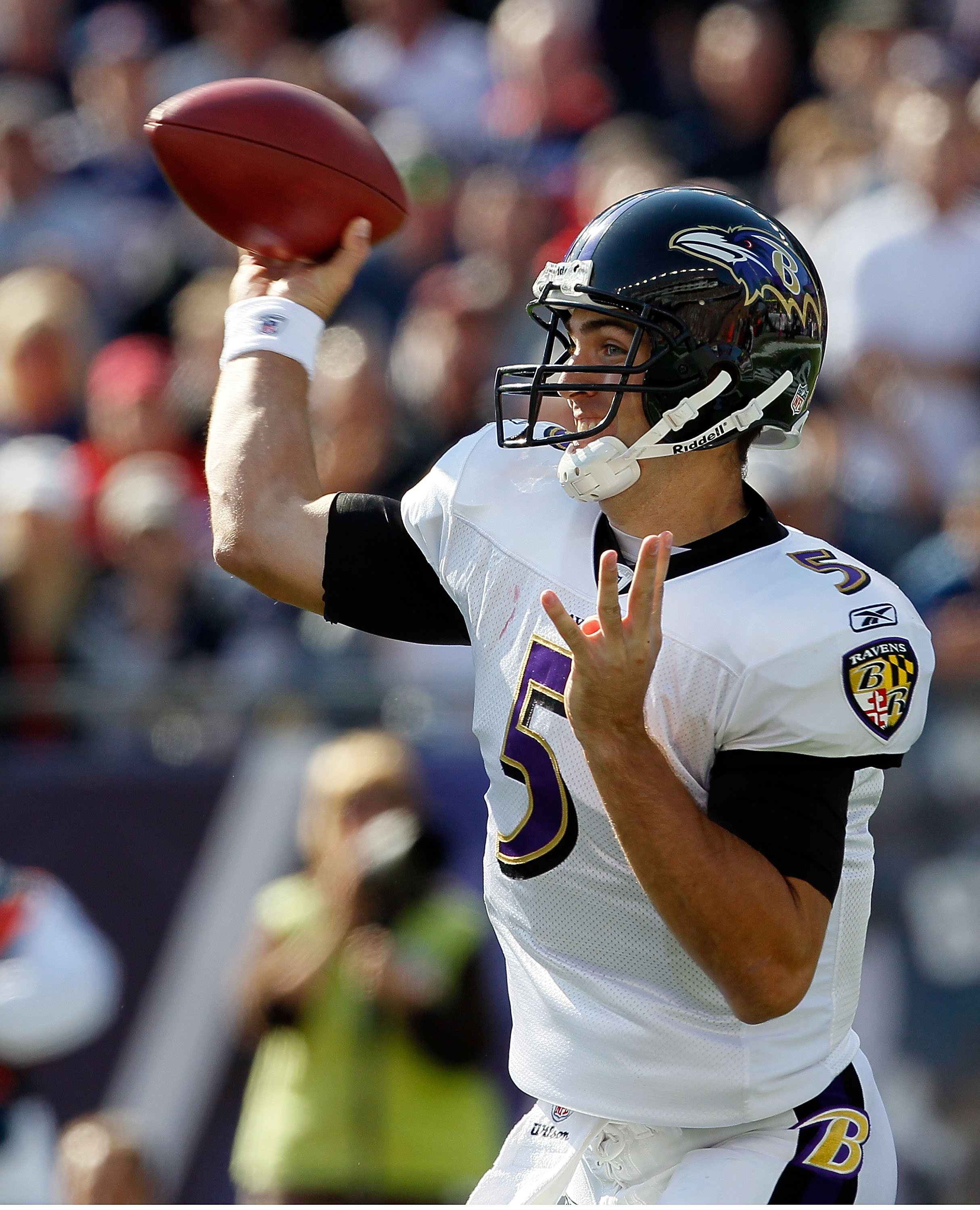 FOXBORO, MA - OCTOBER 17:  Joe Flacco #5 of the Baltimore Ravens throws against the New England Patriots at Gillette Stadium on October 17, 2010 in Foxboro, Massachusetts. (Photo by Jim Rogash/Getty Images)