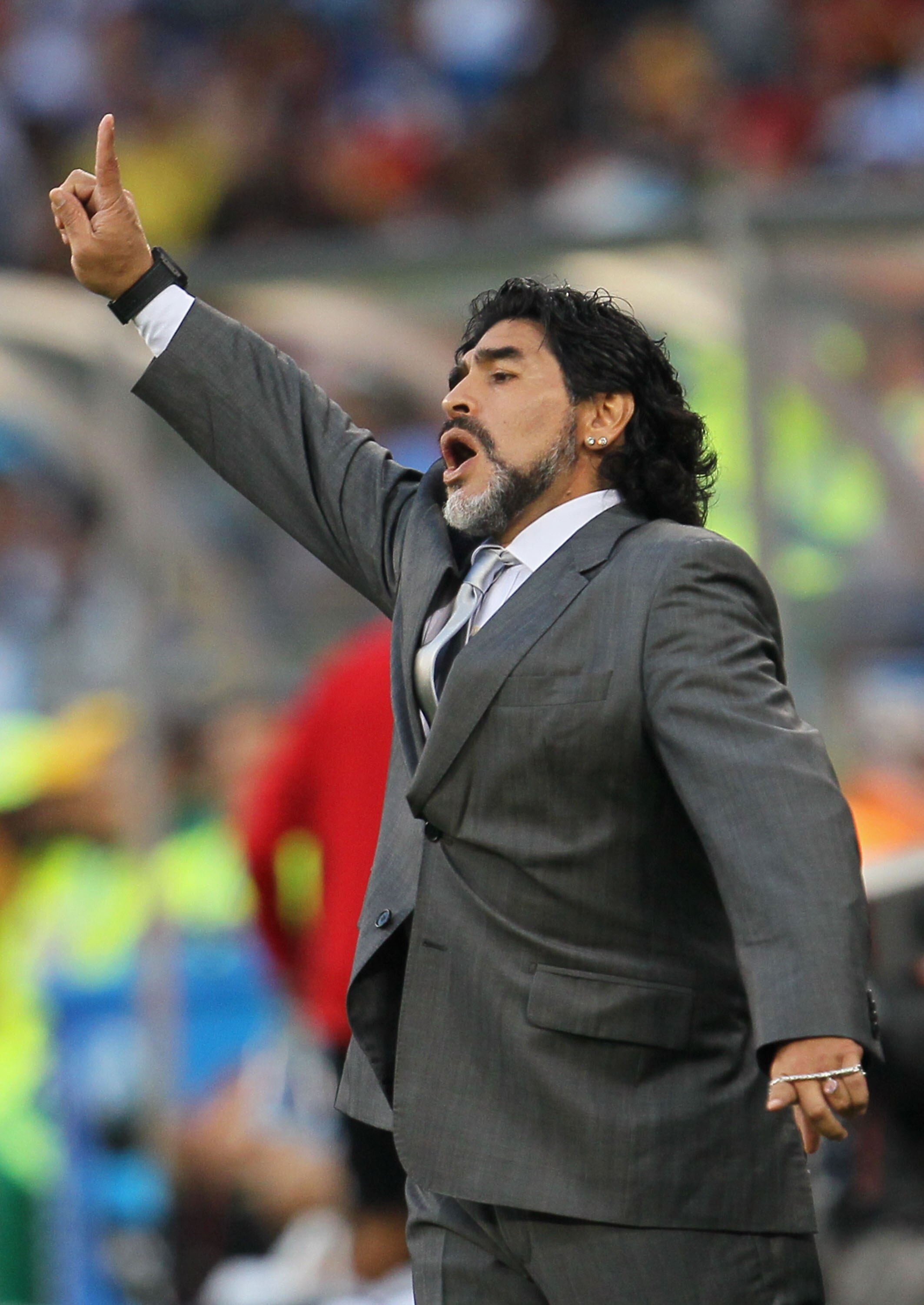 CAPE TOWN, SOUTH AFRICA - JULY 03:  Diego Maradona head coach of Argentina gestures during the 2010 FIFA World Cup South Africa Quarter Final match between Argentina and Germany at Green Point Stadium on July 3, 2010 in Cape Town, South Africa.  (Photo by