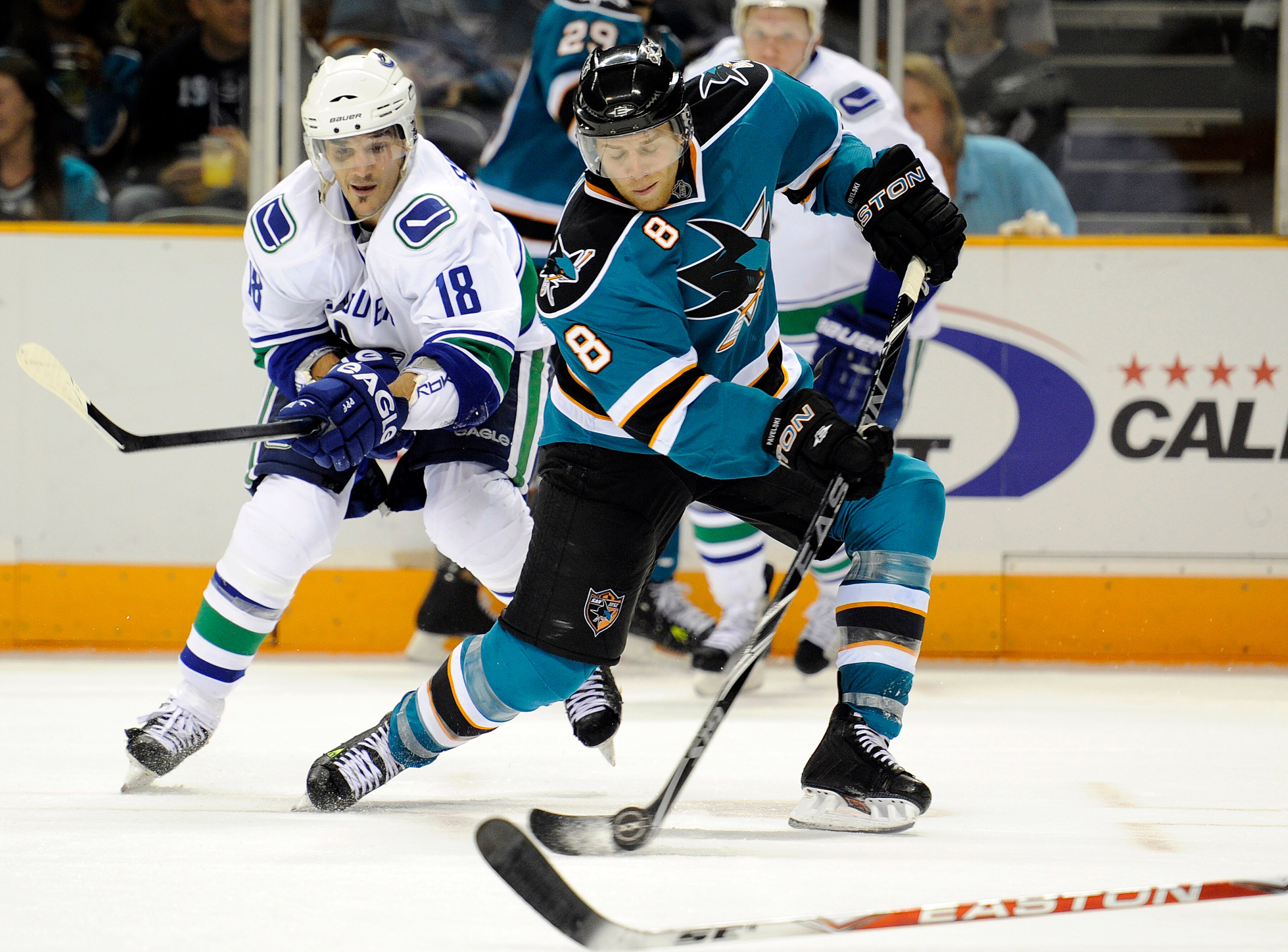 SAN JOSE, CA - SEPTEMBER 29: Joe Pavelski #8 of the San Jose Sharks shoots on goal against the Vancouver Canucks during their preseason game on September 29, 2010 at the HP Pavilion in San Jose, California. The Sharks won the game 6-2. (Photo by Thearon W