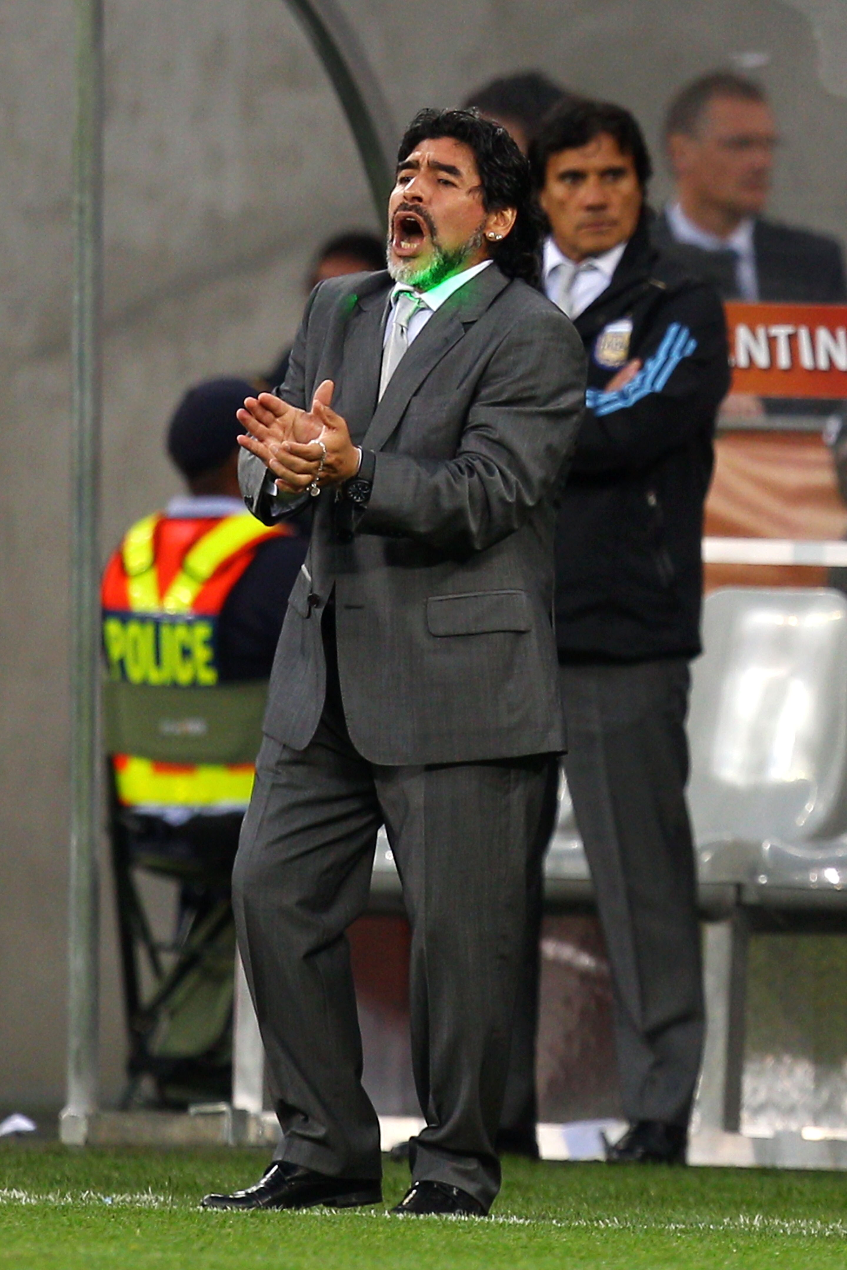 CAPE TOWN, SOUTH AFRICA - JULY 03:  Diego Maradona head coach of Argentina gestures during the 2010 FIFA World Cup South Africa Quarter Final match between Argentina and Germany at Green Point Stadium on July 3, 2010 in Cape Town, South Africa.  (Photo by