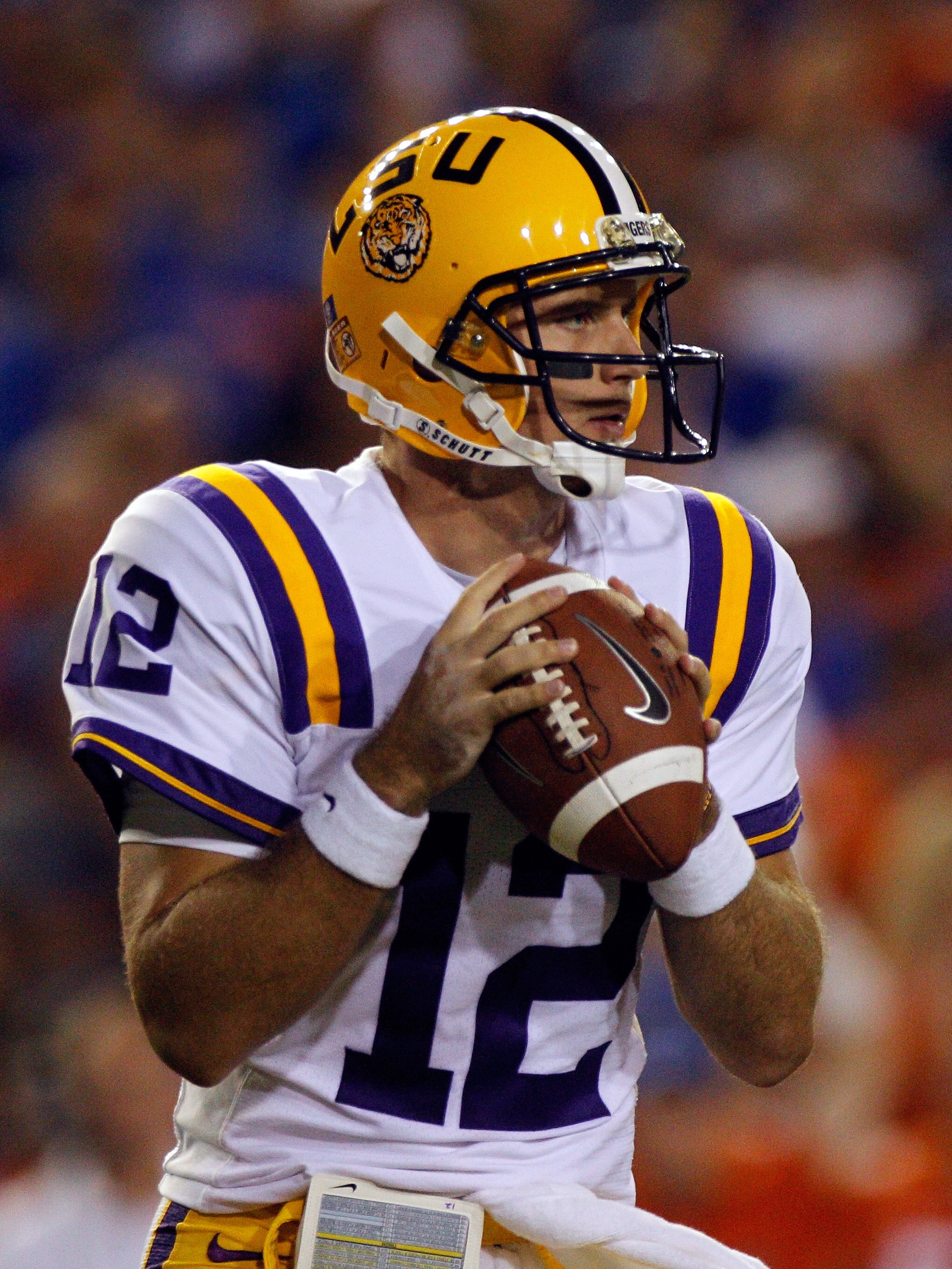 GAINESVILLE, FL - OCTOBER 09:  Quarterback Jarrett Lee #12 of the Louisiana State University Tigers attempts a pass during the game against the Florida Gators at Ben Hill Griffin Stadium on October 9, 2010 in Gainesville, Florida.  (Photo by Sam Greenwood