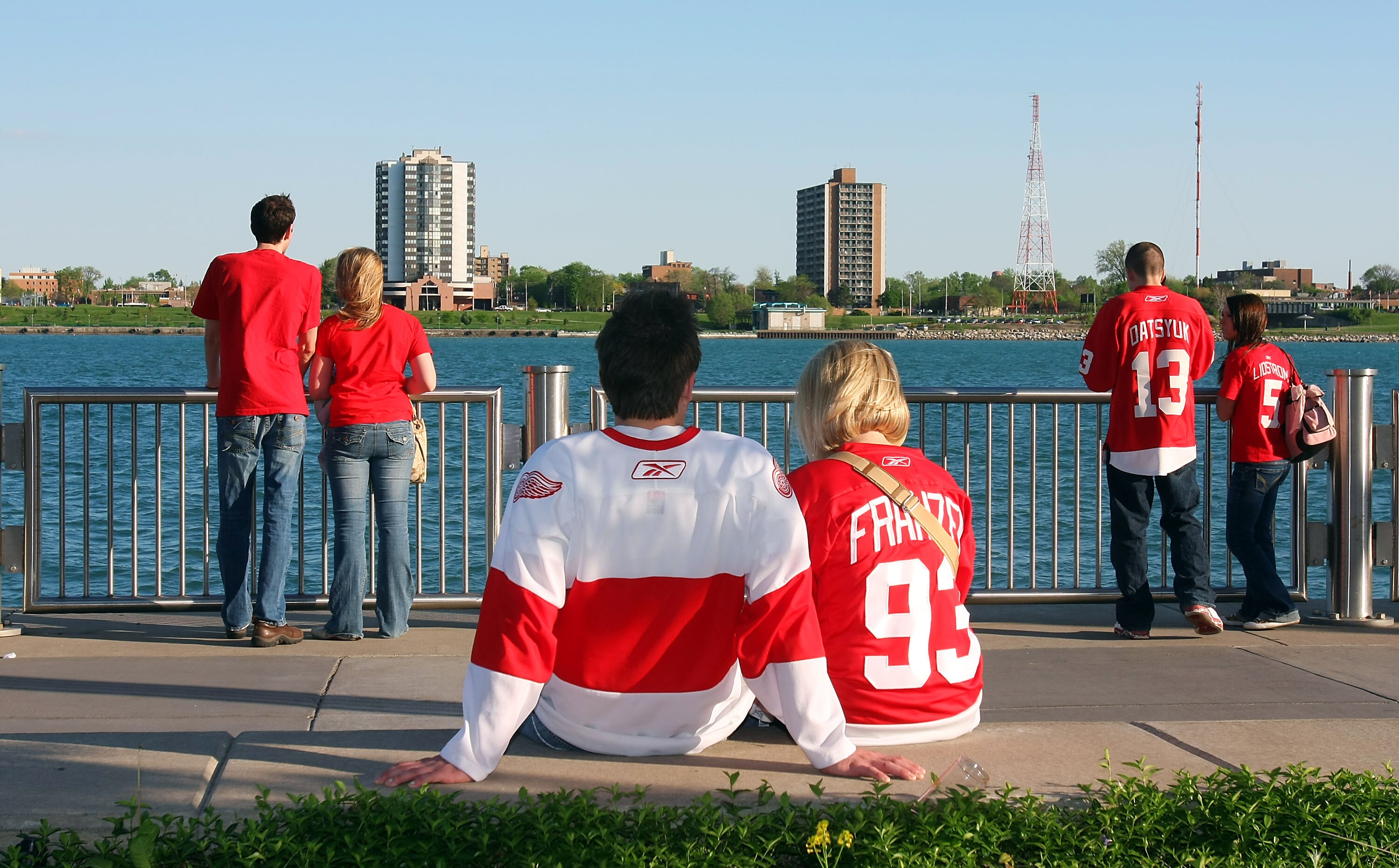 DETROIT - MAY 4:  Fans of the Detroit Red Wings sit outside the arena along the banks of the Detroit River prior to the San Jose Sharks facing the Detroit Red Wings in Game Three of the Western Conference Semifinals during the 2010 Stanley Cup Playoffs at