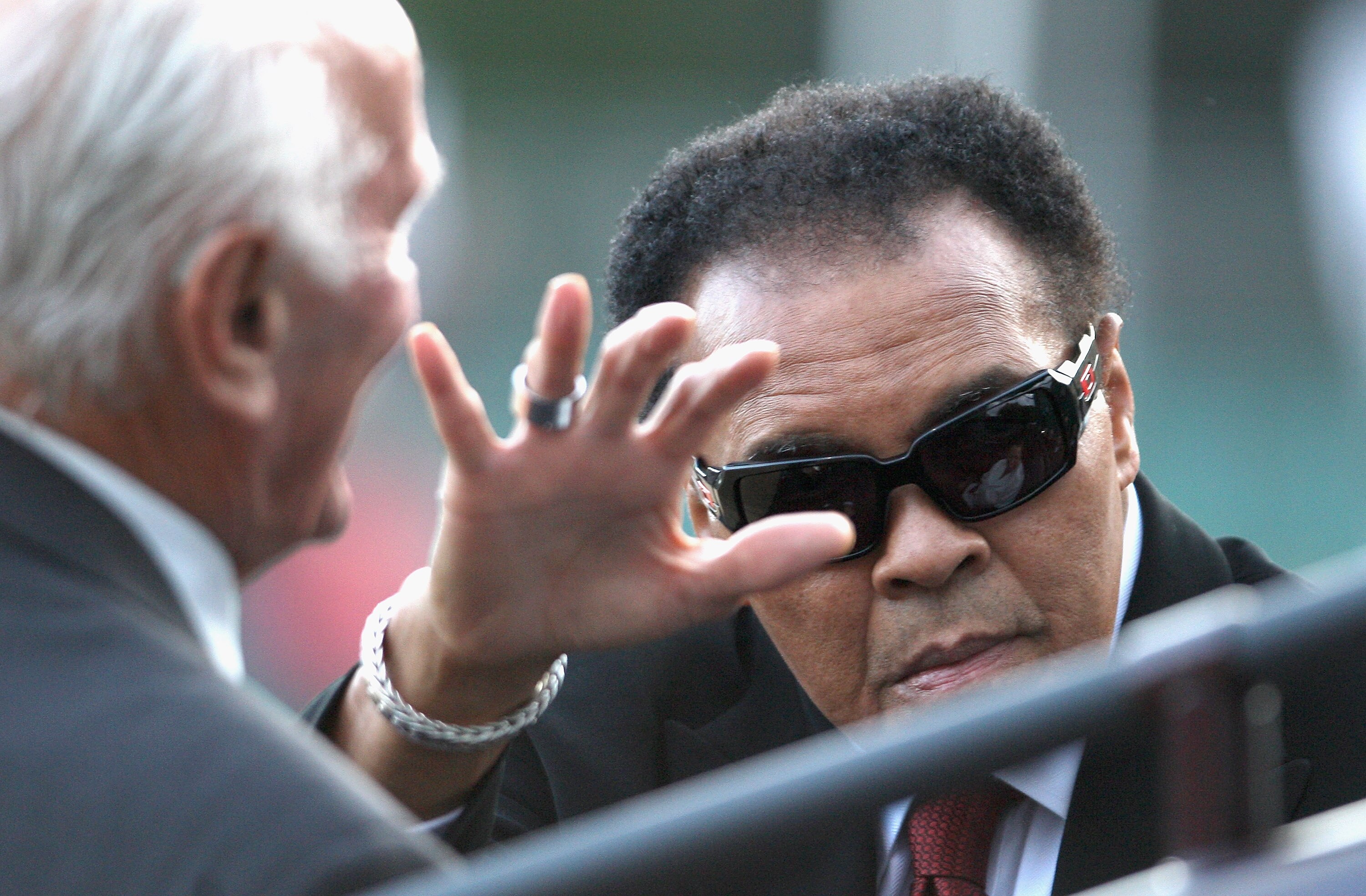 WINDSOR, ENGLAND - AUGUST 28:  Boxers Muhammad Ali and Henry Cooper parade round the ring in the back of a landrover at the 2009 Alltech FEI European Jumping & Dressage Championships in the grounds of Windsor Castle on August 28, 2009 in Windsor, England.