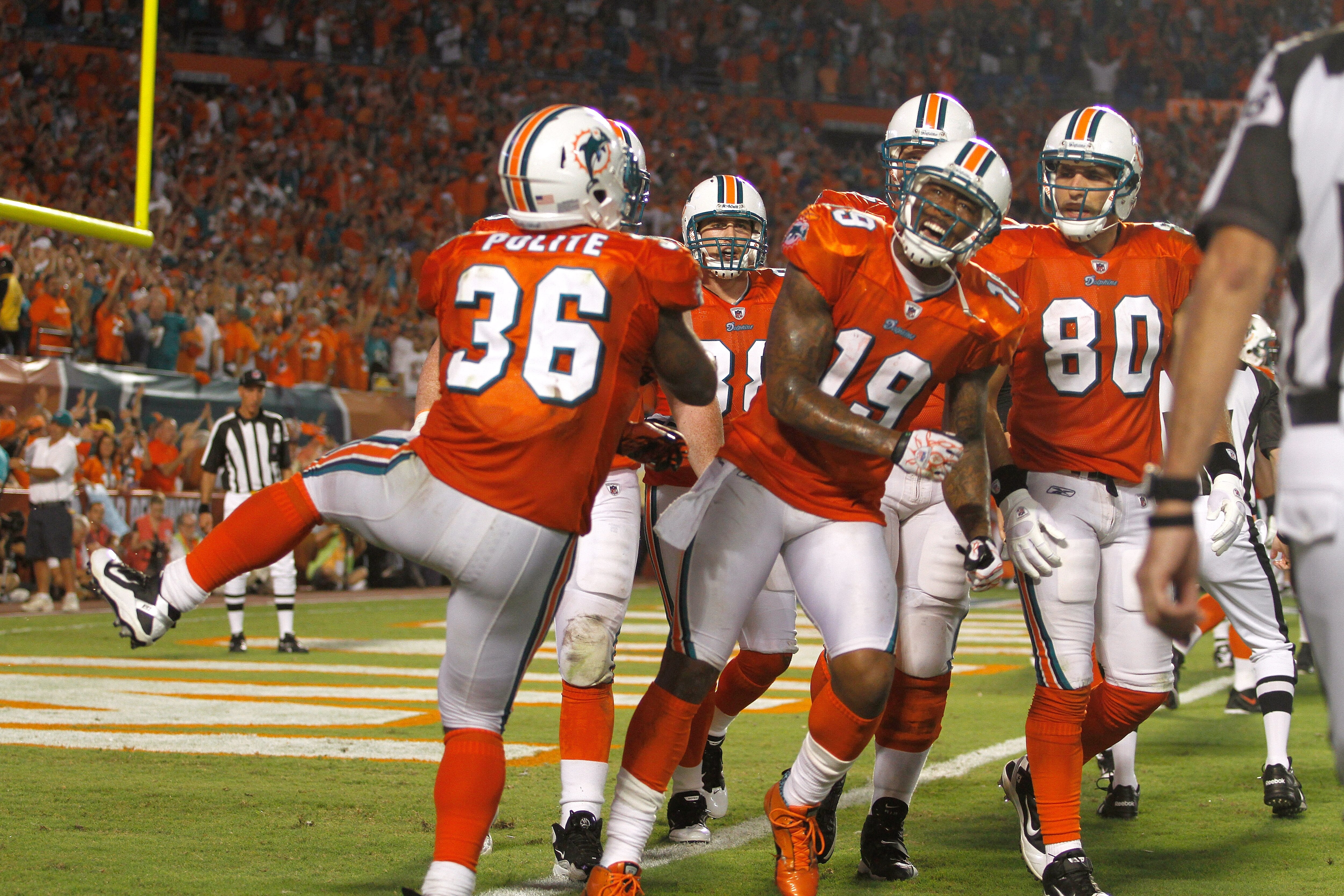MIAMI - SEPTEMBER 26: ReceiverBrandon Marshall #19 of the Miami Dolphins celebrates a touchdown against the New York Jets at Sun Life Stadium on September 26, 2010 in Miami, Florida. The Jets won 31-23. (Photo by Marc Serota/Getty Images)