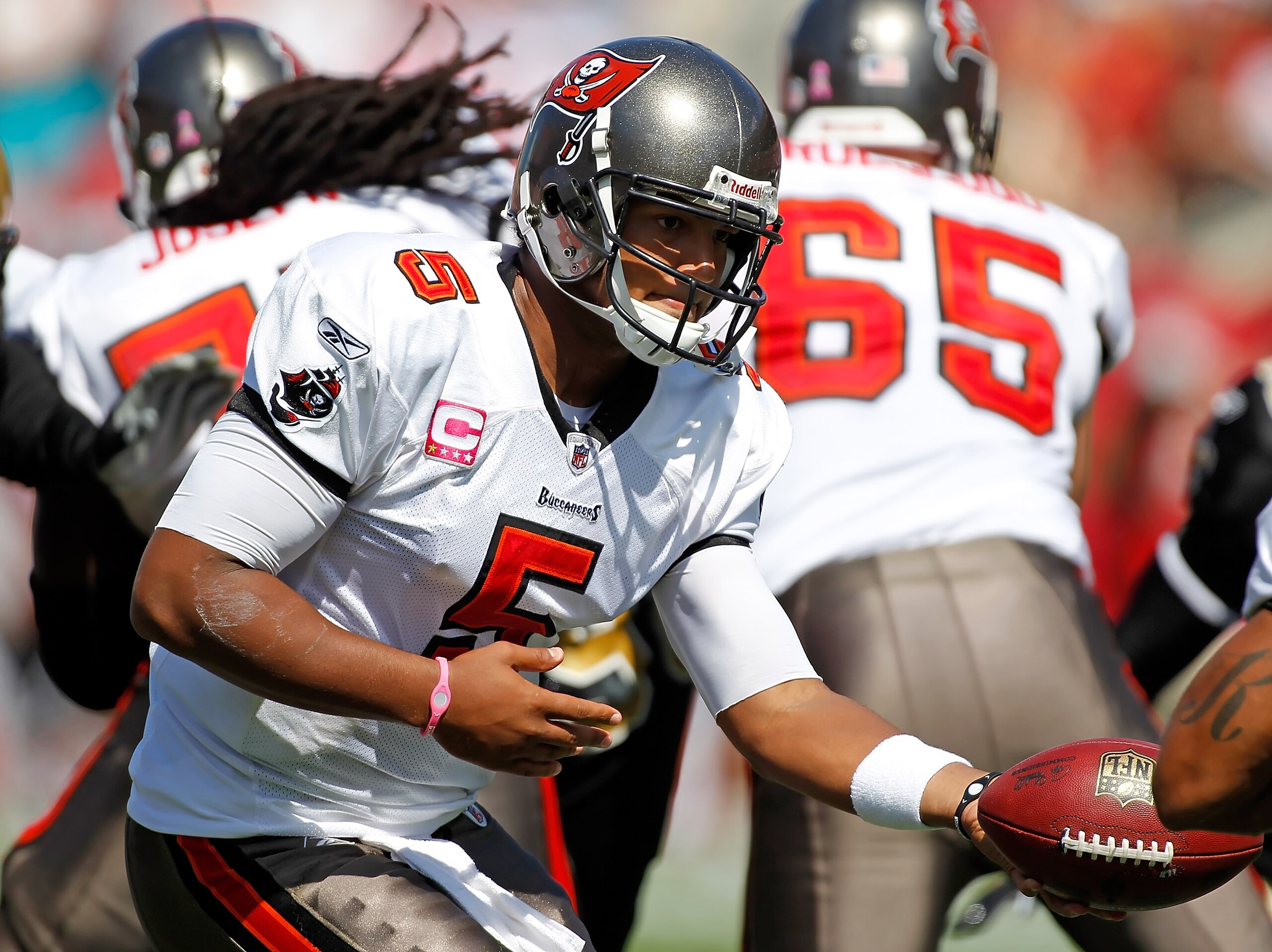 TAMPA, FL - OCTOBER 17:  Quarterback Josh Freeman #5 of the Tampa Bay Buccaneers hands the ball off against the New Orleans Saints during the game at Raymond James Stadium on October 17, 2010 in Tampa, Florida.  (Photo by J. Meric/Getty Images)
