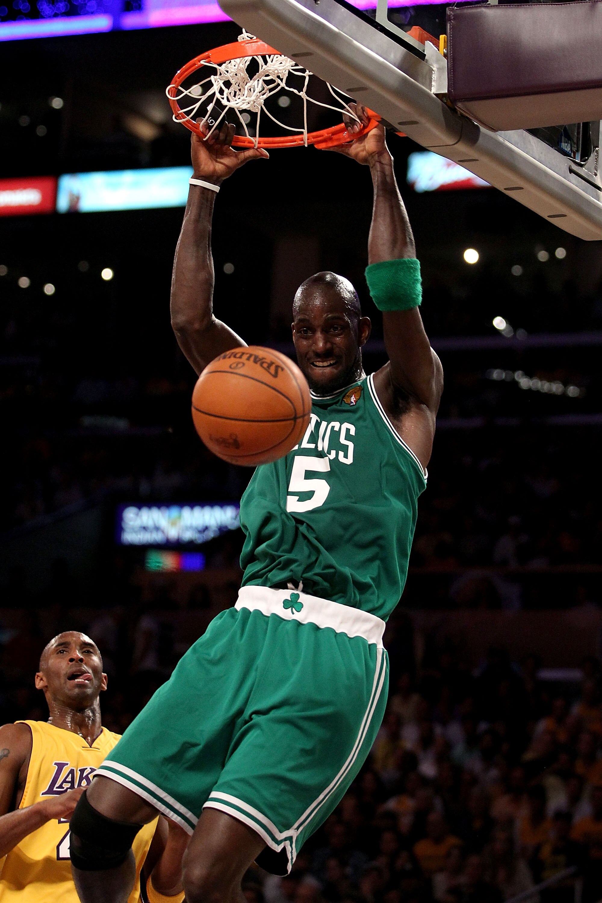 LOS ANGELES, CA - JUNE 17:  Kevin Garnett #5 of the Boston Celtics slam dunks over Kobe Bryant #24 of the Los Angeles Lakers in the first quarter of Game Seven of the 2010 NBA Finals at Staples Center on June 17, 2010 in Los Angeles, California.  NOTE TO