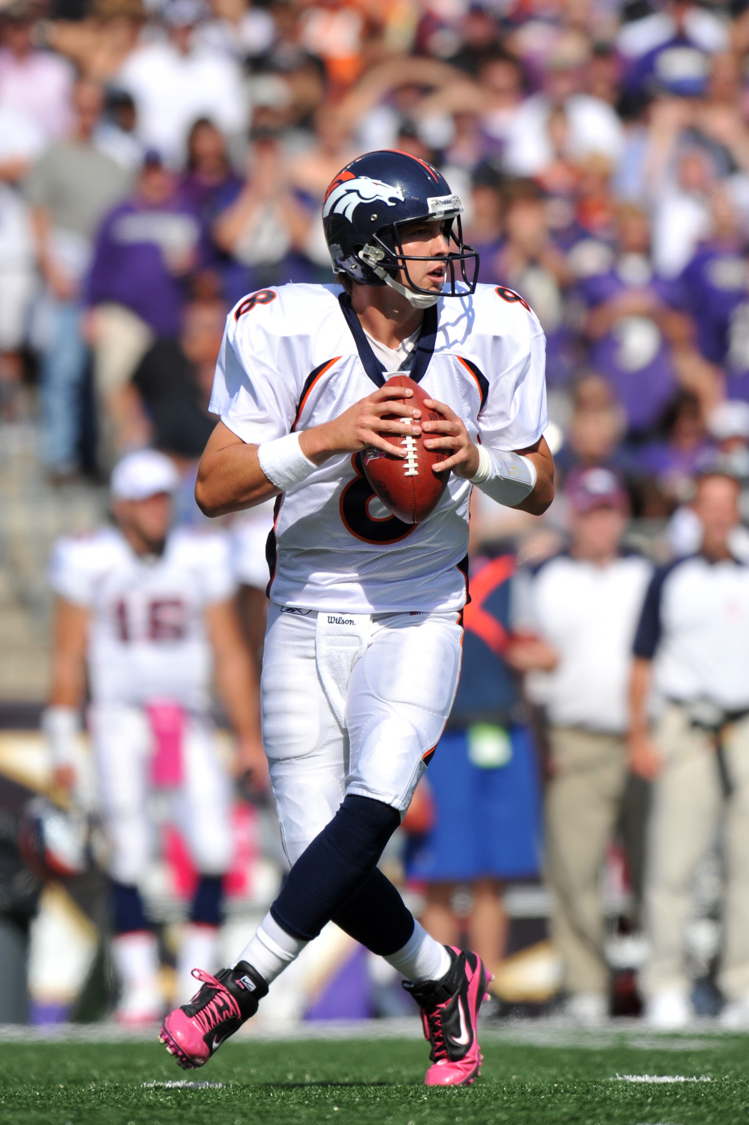 BALTIMORE, MD - OCTOBER 10: Kyle Orton #8 of the Denver Broncos passes against the Baltimore Ravens at M&T Bank Stadium on October 10, 2010 in Baltimore, Maryland. Players wore pink in recognition of Breast Cancer Awareness Month. The Ravens defeated the