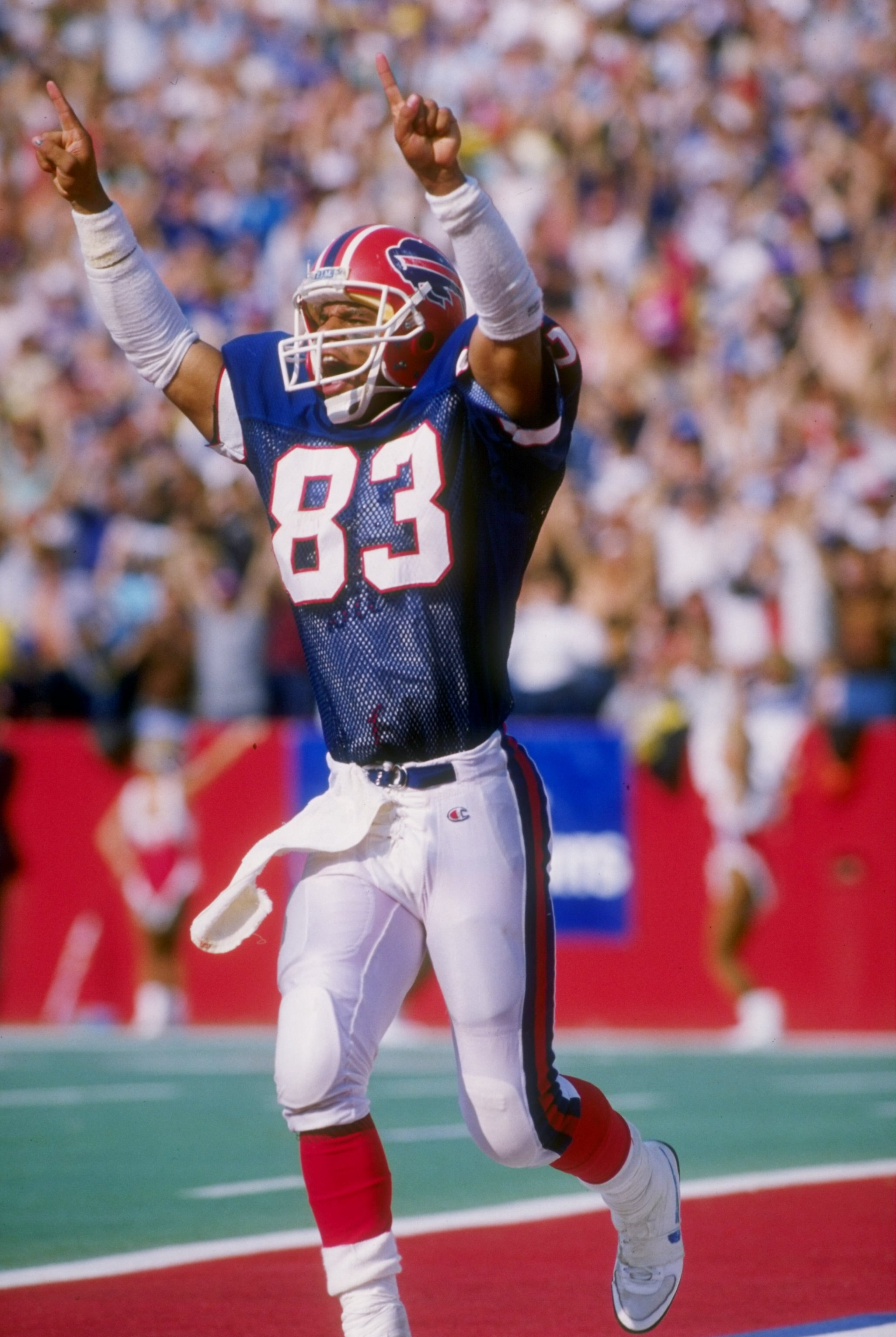 20 Sep 1987: Wide receiver Andre Reed of the Buffalo Bills celebrates scoring a touchdown during a game against the Houston Oilers at Rich Stadium in Orchard Park, New York. The Bills won the game 34-20.