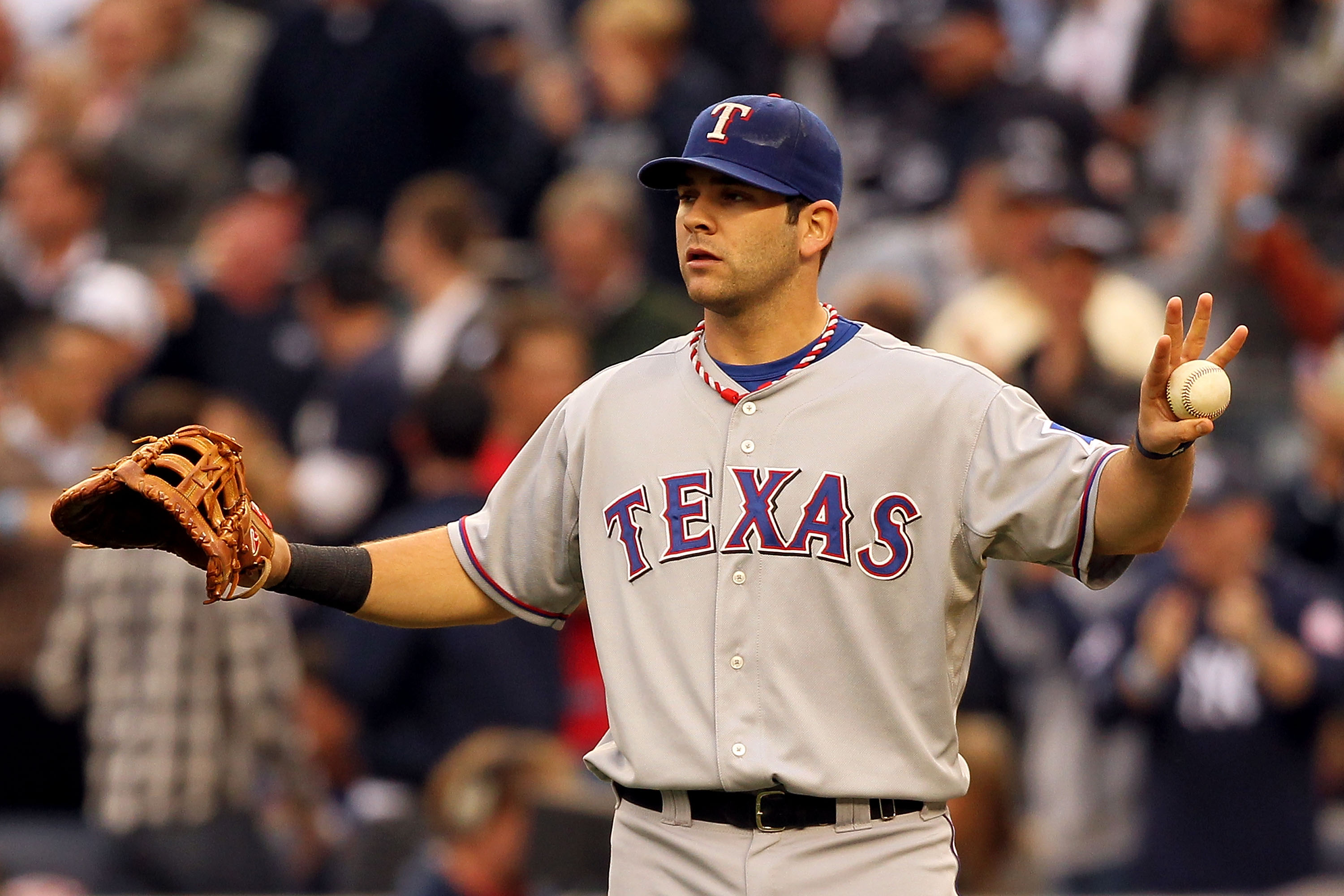 NEW YORK - OCTOBER 20:  Mitch Moreland #18 of the Texas Rangers gestures to his team against the New York Yankees in Game Five of the ALCS during the 2010 MLB Playoffs at Yankee Stadium on October 20, 2010 in the Bronx borough of New York City.  (Photo by