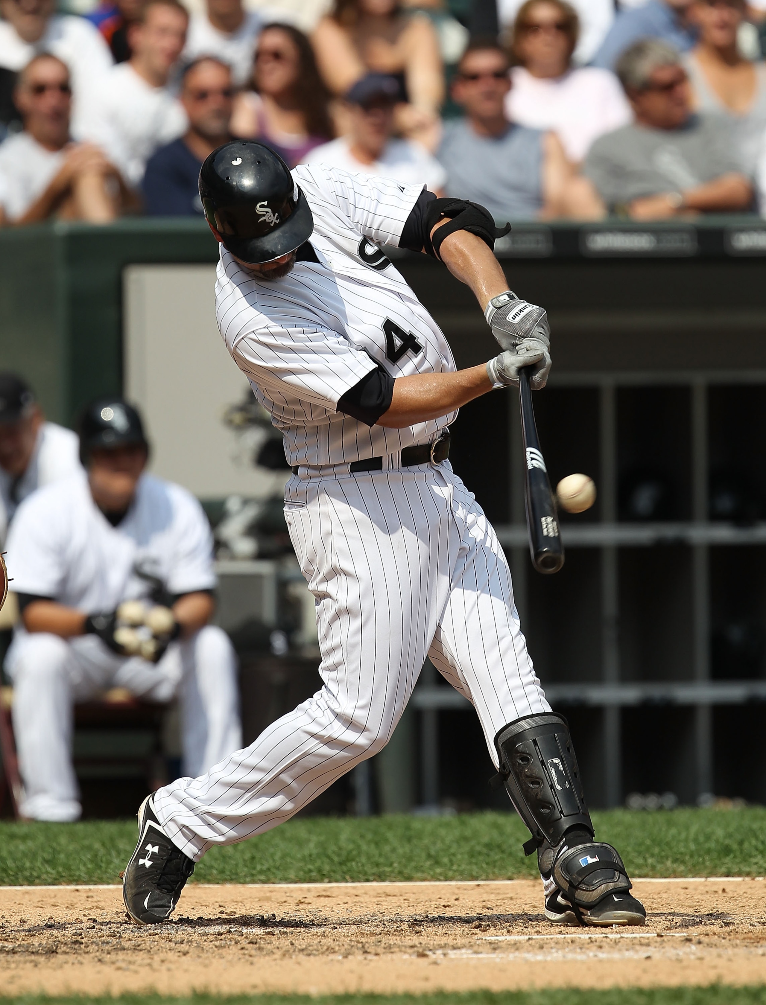 CHICAGO - AUGUST 29: Paul Konerko #14 of the Chicago White Sox hits the ball against the New York Yankees at U.S. Cellular Field on August 29, 2010 in Chicago, Illinois. The Yankees defeated the White Sox 2-1. (Photo by Jonathan Daniel/Getty Images) CHICAGO - AUGUST 29: Paul Konerko #14 of the Chicago White Sox hits the ball against the New York Yankees at U.S. Cellular Field on August 29, 2010 in Chicago, Illinois. The Yankees defeated the White Sox 2-1. (Photo by Jonathan Daniel/Getty Images)