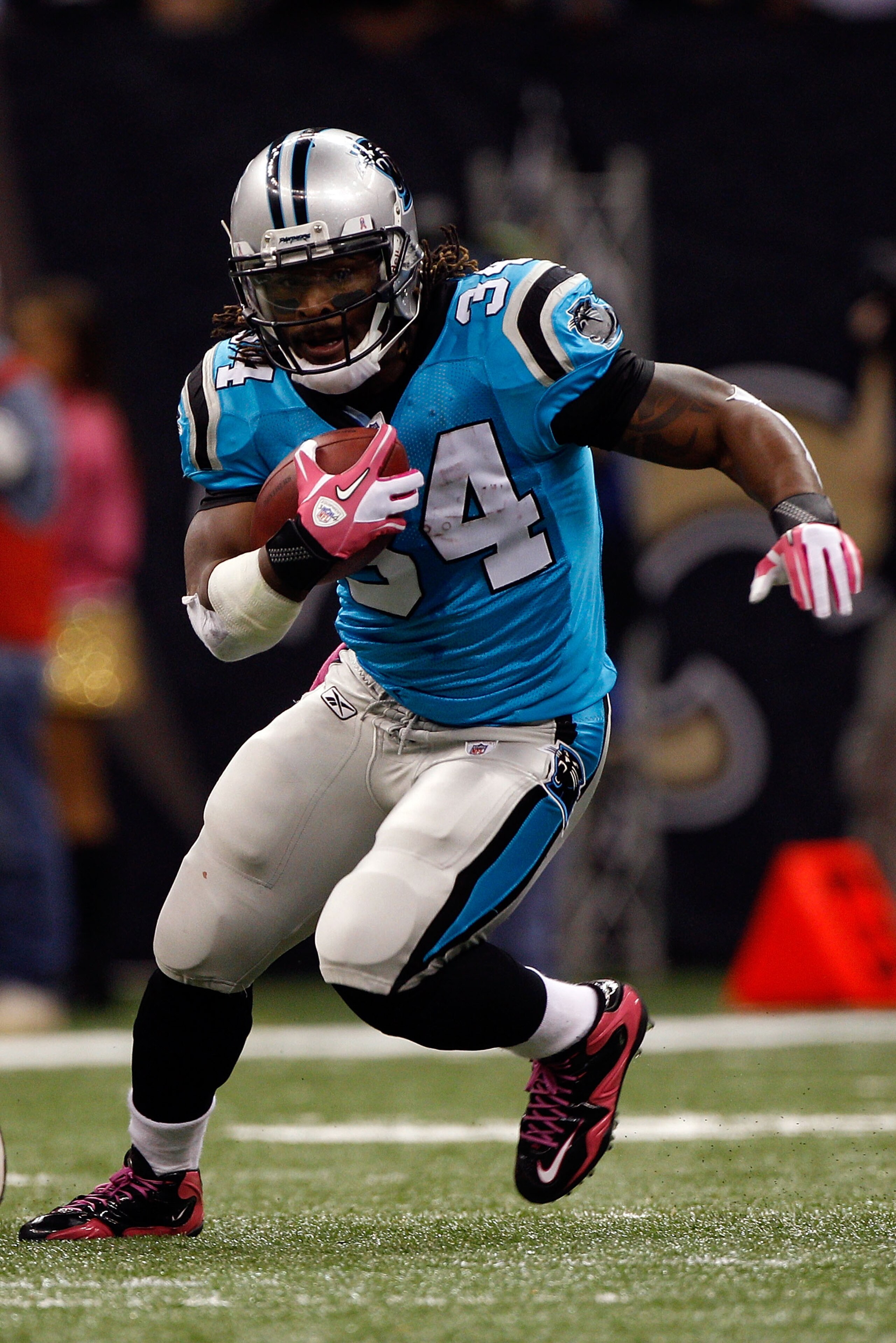 NEW ORLEANS - OCTOBER 03:  DeAngelo Williams #34 of the Carolina Panthers in action during the game against the New Orleans Saints at the Louisiana Superdome on October 3, 2010 in New Orleans, Louisiana.  (Photo by Chris Graythen/Getty Images)