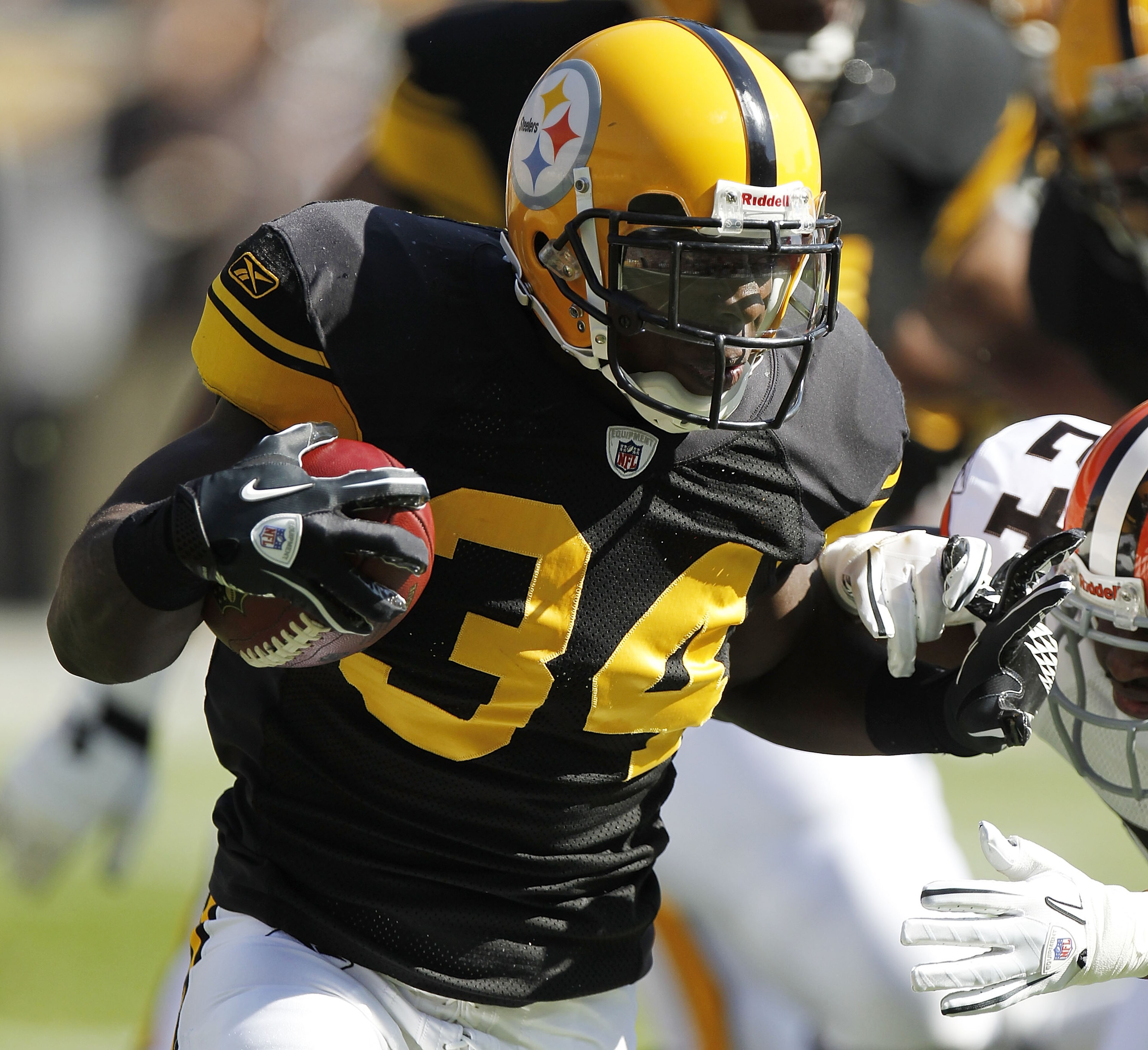 PITTSBURGH - OCTOBER 17: Rashard Mendenhall #34 of the Pittsburgh Steelers tries to get around the tackle of Sheldon Brown #24 of the Cleveland Browns on October 17, 2010 at Heinz Field in Pittsburgh, Pennsylvania.  (Photo by Gregory Shamus/Getty Images)