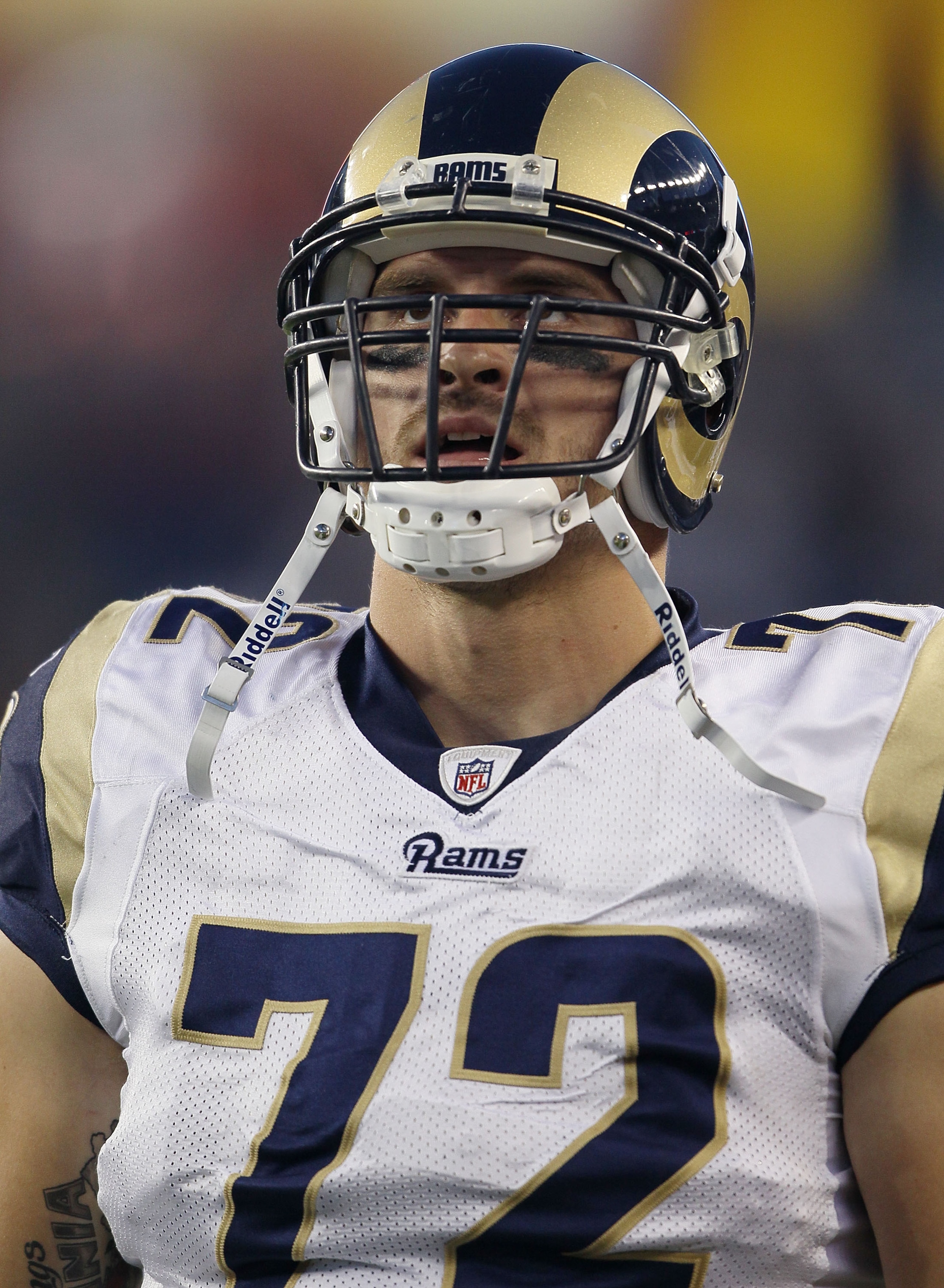 FOXBORO, MA - AUGUST 26:  Chris Long #72 of the St. Louis Rams looks on from the sideline against the New England Patriots on August 26, 2010 at Gillette Stadium in Foxboro, Massachusetts.  (Photo by Elsa/Getty Images)