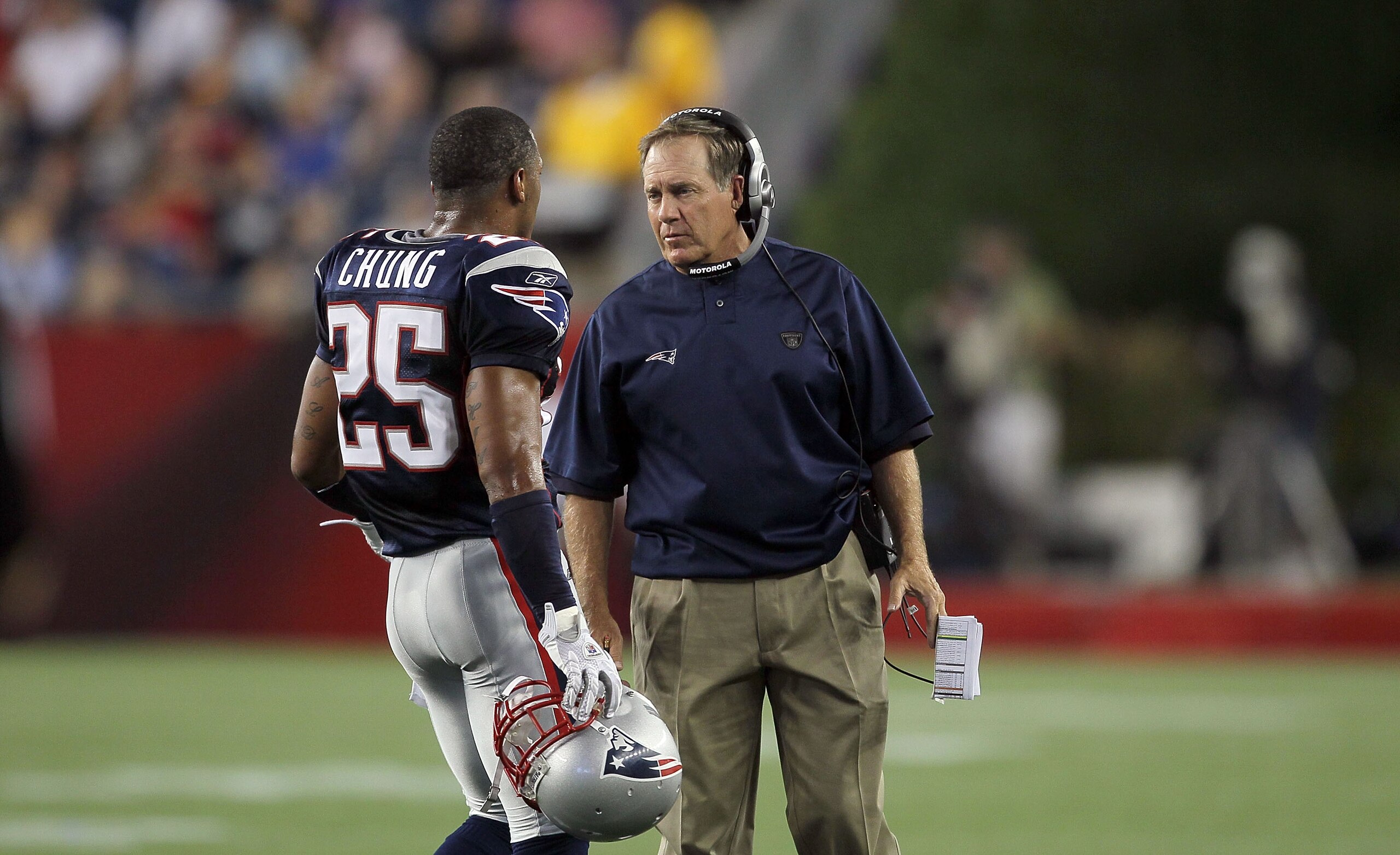 FOXBORO, MA - AUGUST 12: Patrick Chung # 25 and Coach Bill Belichick of the New England Patriots talk during the preseason game against the New Orleans Saints at Gillette Stadium on August 12, 2010 in Foxboro, Massachusetts. (Photo by Jim Rogash/Getty Ima
