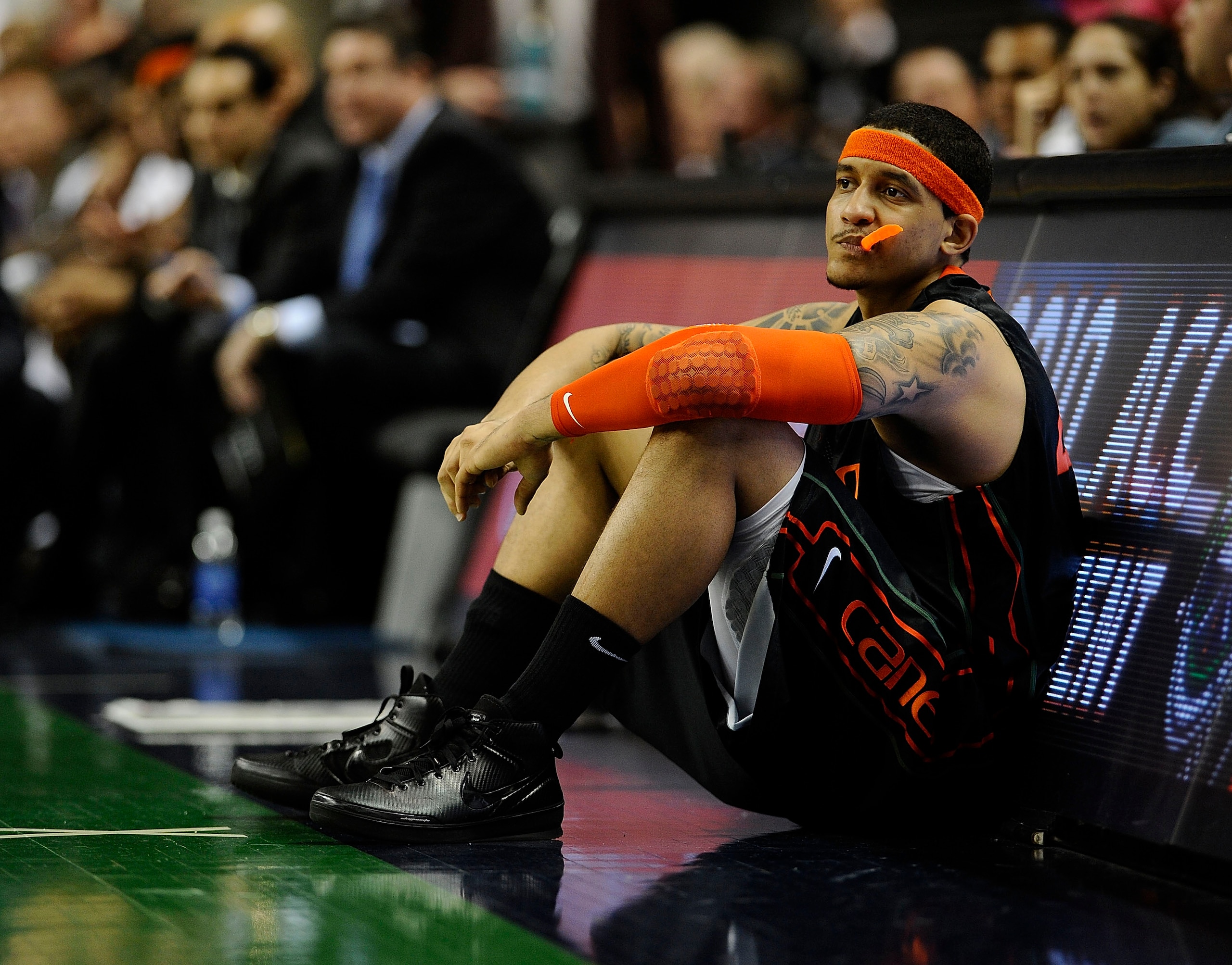 GREENSBORO, NC - MARCH 13:  Julian Gamble #45 of the University of Miami Hurricanes waits to enter the game  against the Duke Blue Devils in their semifinal game in the 2010 ACC Men's Basketball Tournament at the Greensboro Coliseum on on March 13, 2010 i