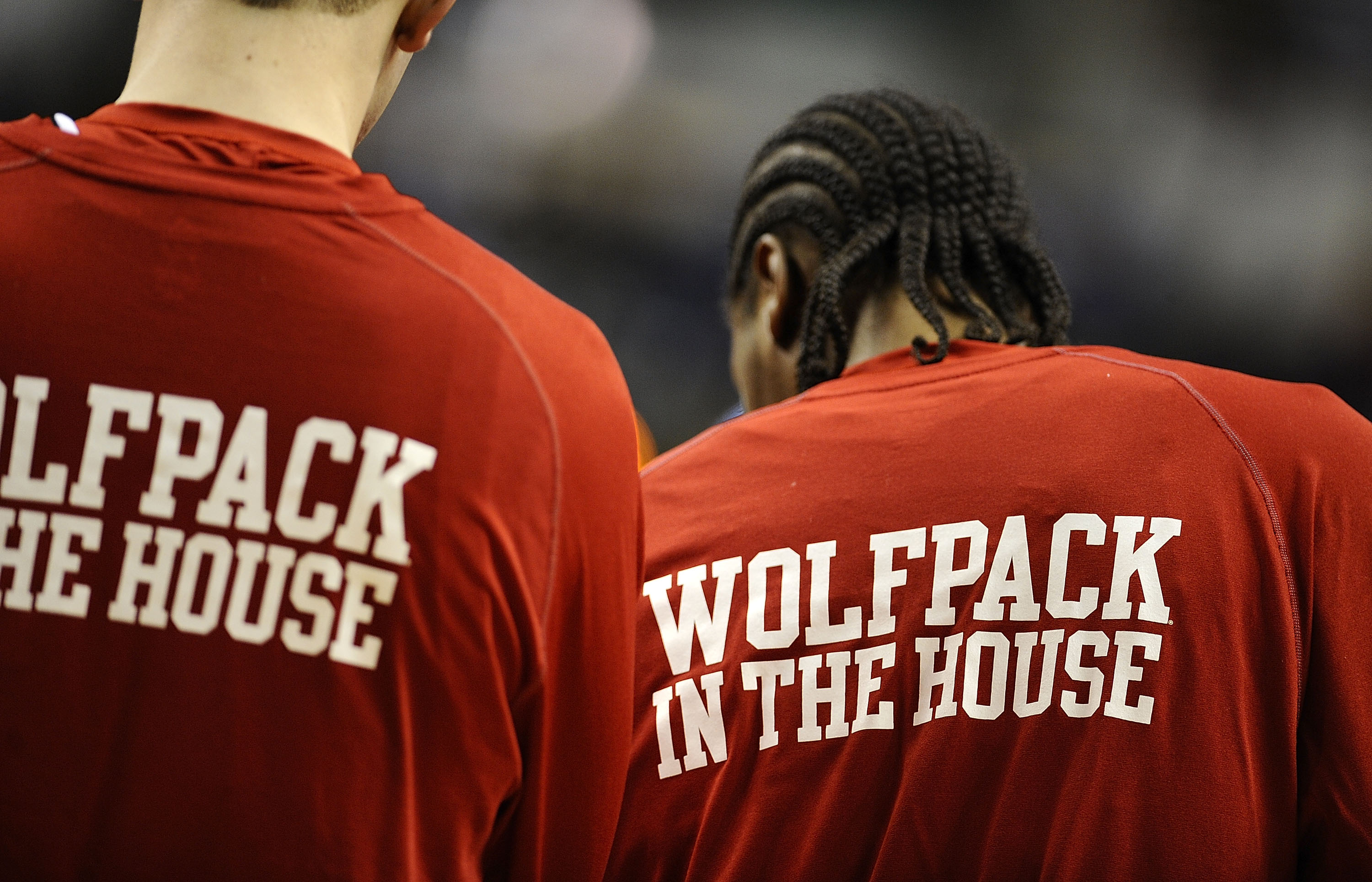 GREENSBORO, NC - MARCH 13:  Members of the North Carolina State Wolfpack stand during a timeout against the Georgia Tech Yellow Jackets in their semifinal game in the 2010 ACC Men's Basketball Tournament at the Greensboro Coliseum on on March 13, 2010 in