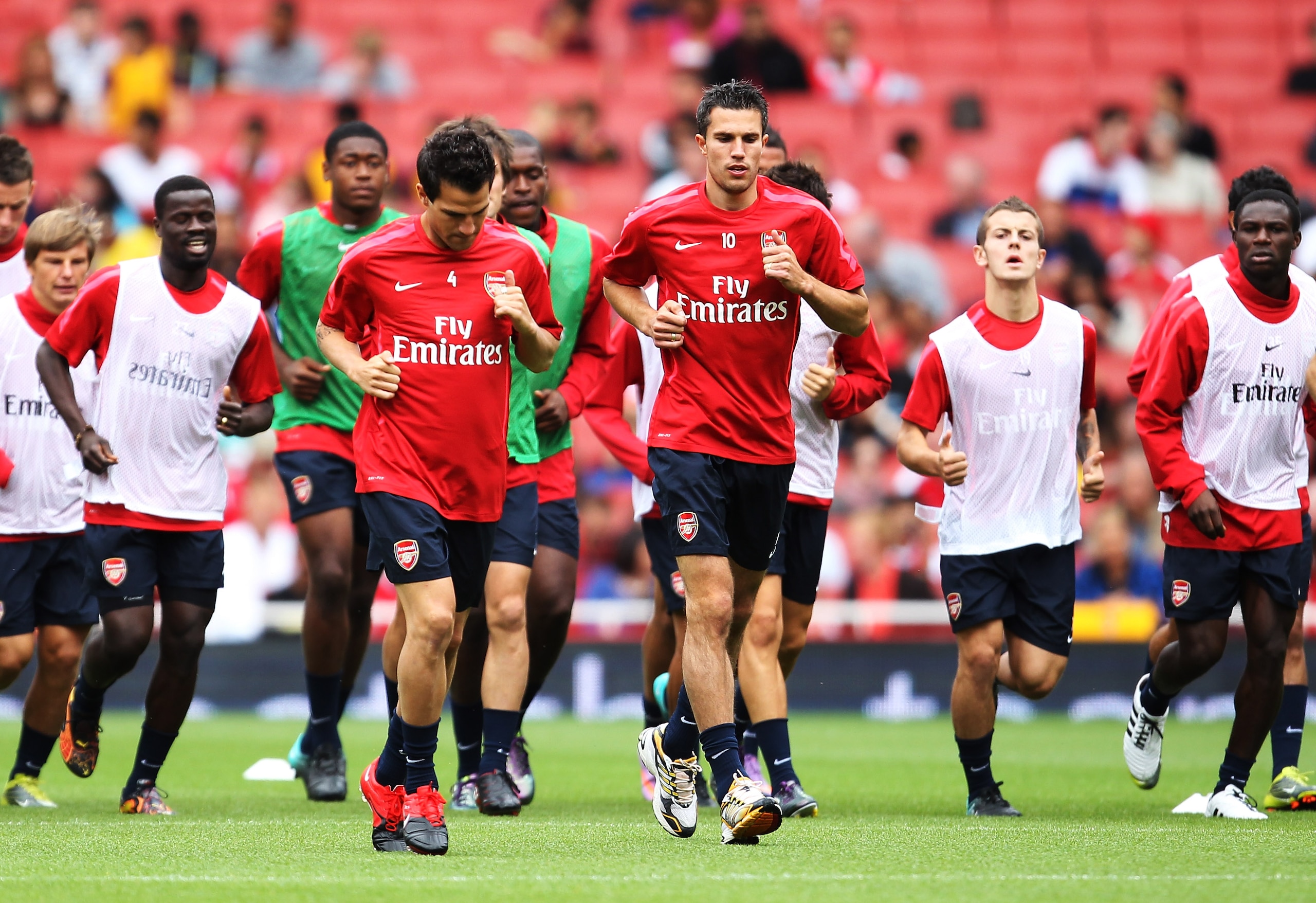 LONDON, ENGLAND - AUGUST 05:  Cesc Fabregas of Arsenal (L) trains with his teammate Robin Van Persie (10) during an Arsenal open training session at Emirates Stadium on August 5, 2010 in London, England.  (Photo by Bryn Lennon/Getty Images)