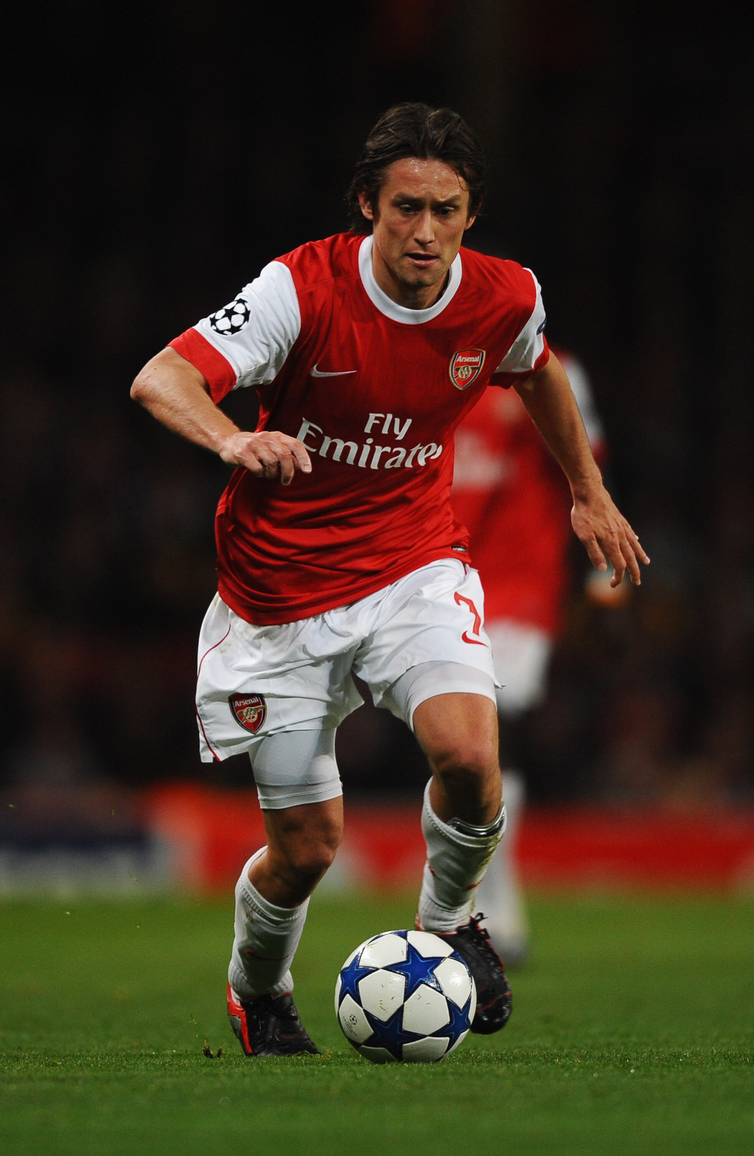 LONDON, ENGLAND - OCTOBER 19:  Tomas Rosicky of Arsenal in action during the UEFA Champions League Group H match between Arsenal and FC Shakhtar Donetsk at the Emirates Stadium on October 19, 2010 in London, England.  (Photo by Laurence Griffiths/Getty Im