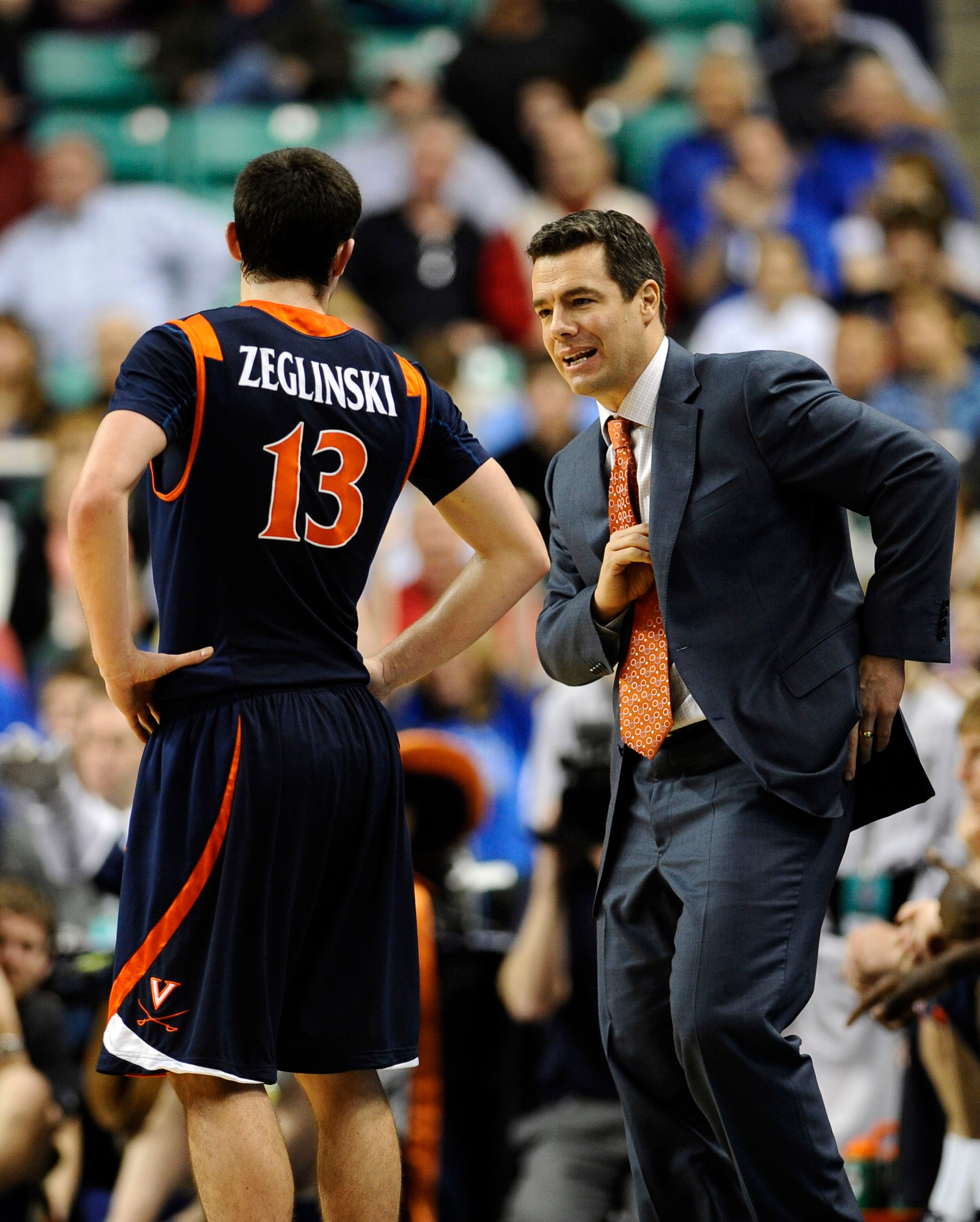 GREENSBORO, NC - MARCH 12:  Sammy Zeglinski and Tony Bennett, head coach of the University of Virginia Cavaliers confer in a quarterfinal game against the Duke Blue Devils in the 2010 ACC Men's Basketball Tournament at the Greensboro Coliseum on March 12,