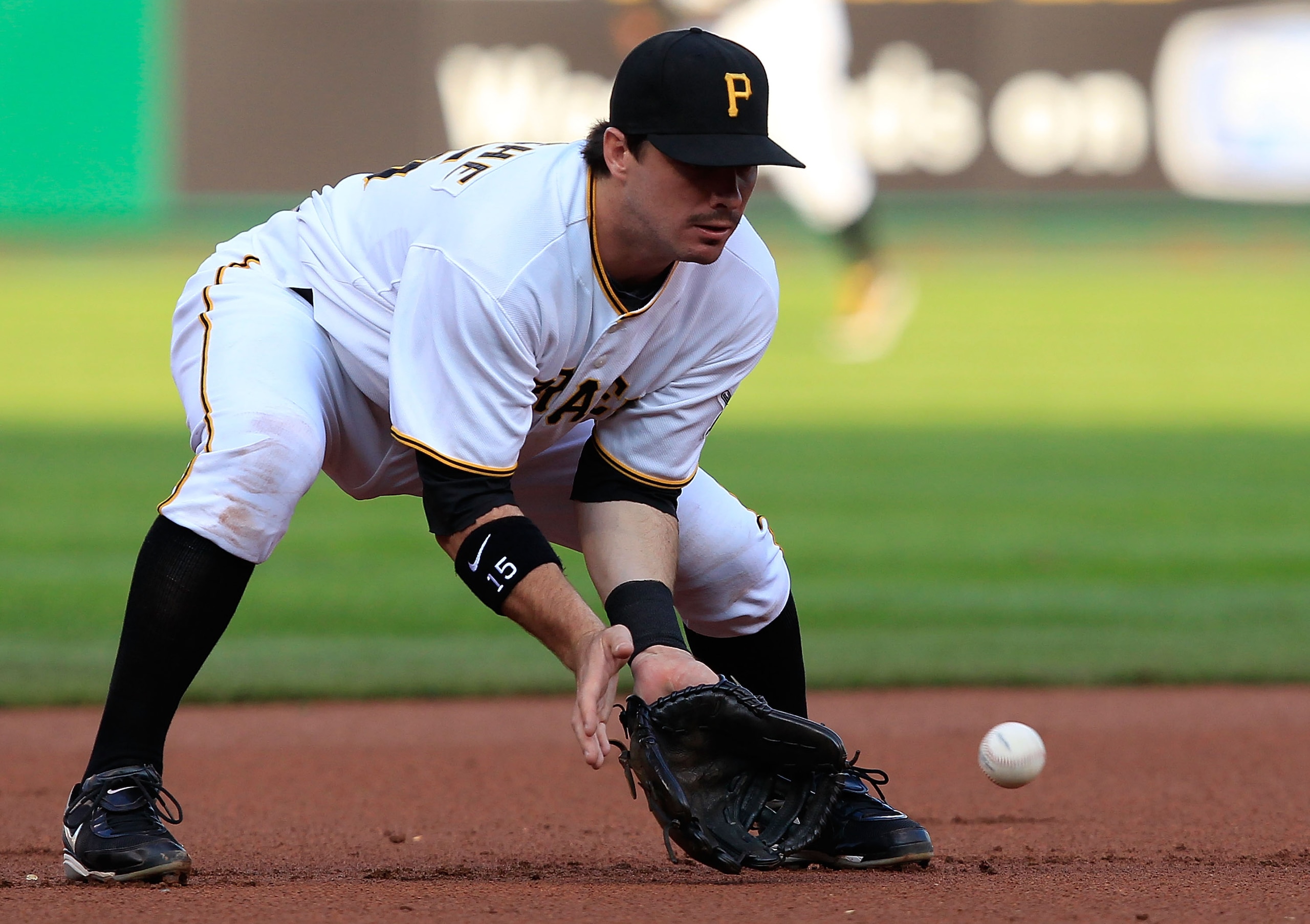 PITTSBURGH - JUNE 01:  Andy LaRoche #15 of the Pittsburgh Pirates fields a ground ball against the Chicago Cubs during the game on June 1st, 2010 at PNC Park in Pittsburgh, Pennsylvania.  (Photo by Jared Wickerham/Getty Images)