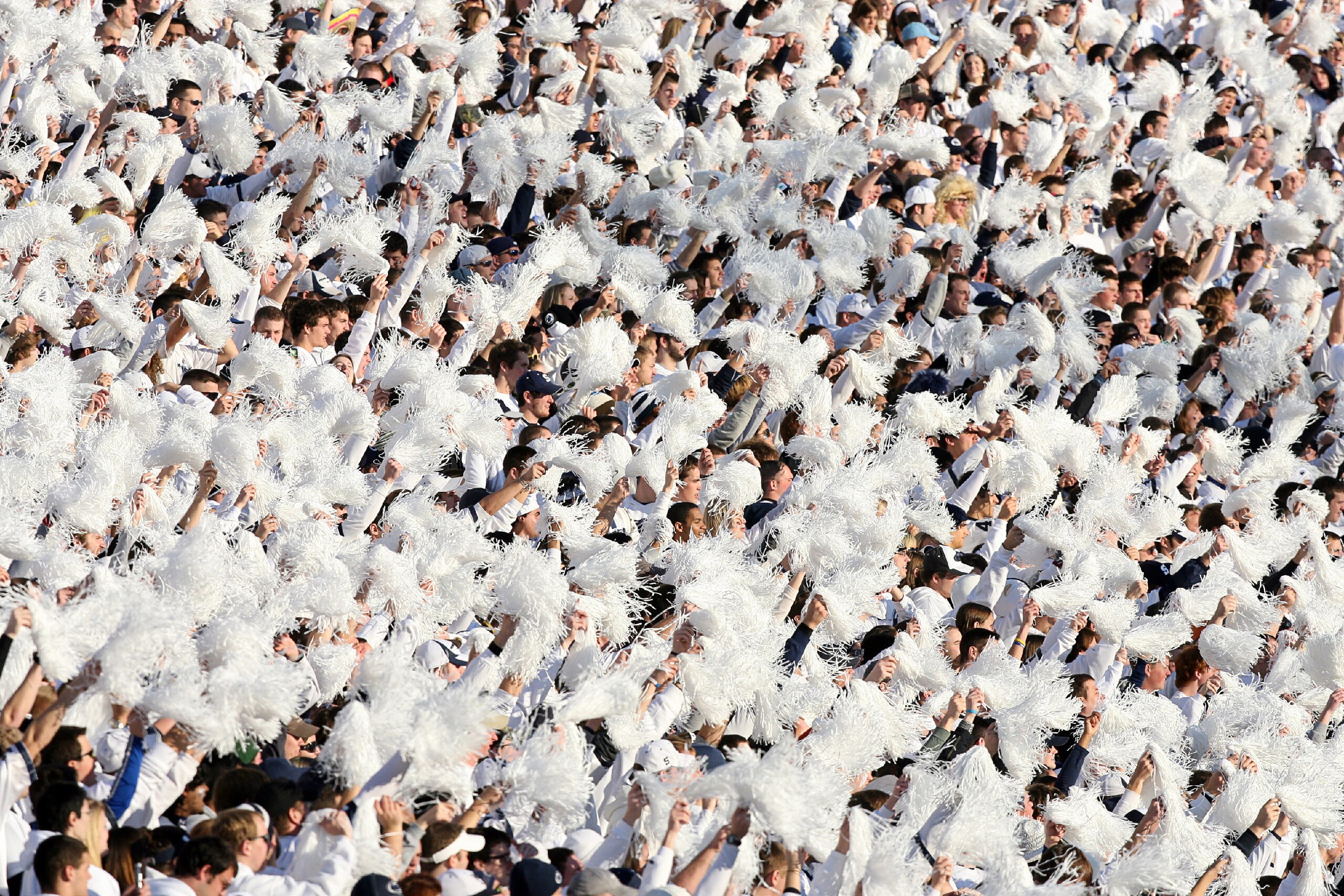 STATE COLLEGE, PA - NOVEMBER 7: Penn State Nittany Lions fans cheer during a 'white out' before a game against the Ohio State Buckeyes on November 7, 2009 at Beaver Stadium in State College, Pennsylvania. Ohio State won 24-7. (Photo by Hunter Martin/Getty